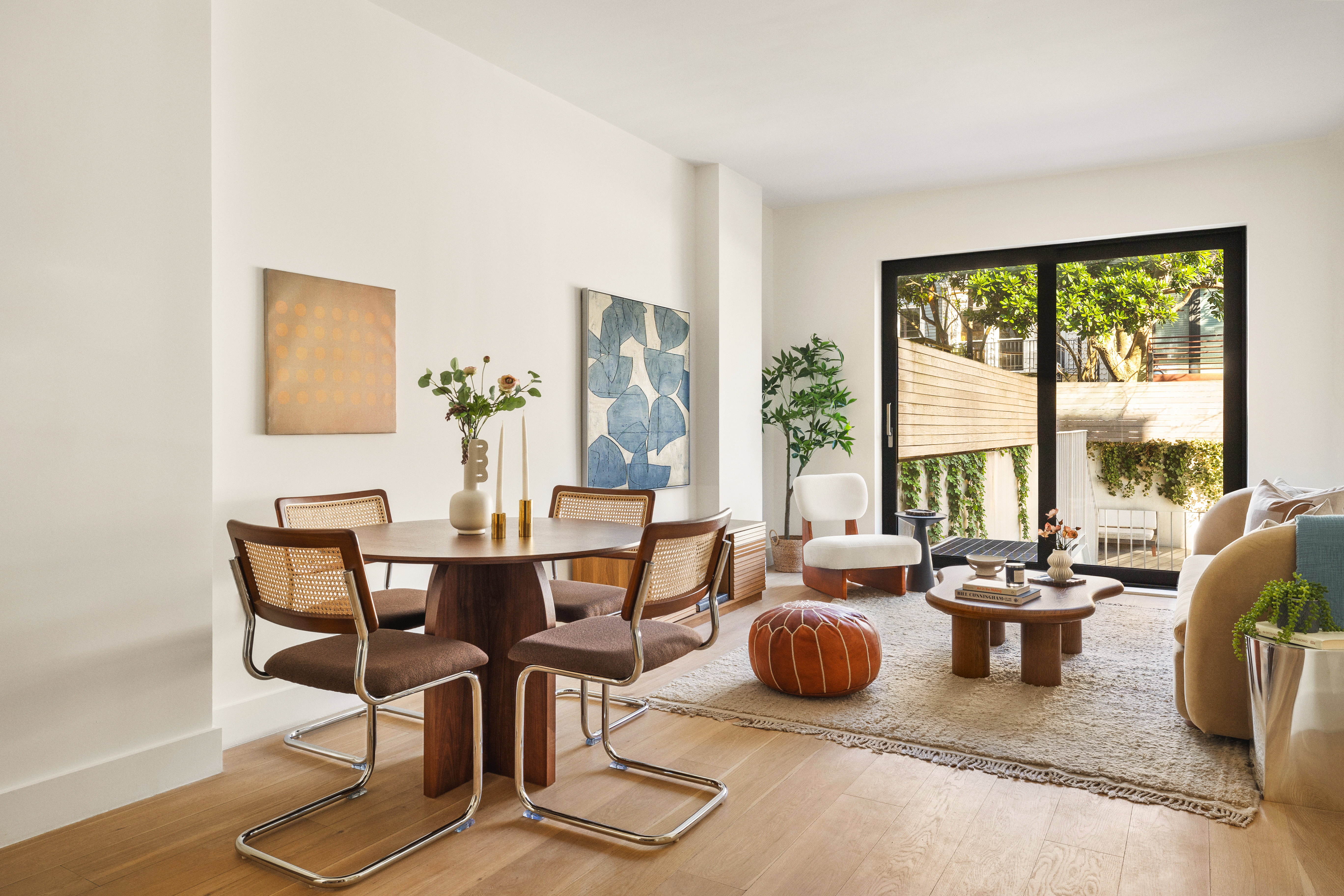 225 14th Street, Unit GARDEN A Brooklyn, NY 11215 - Photo 2 of 13 a view of a dining room with furniture large windows and wooden floor