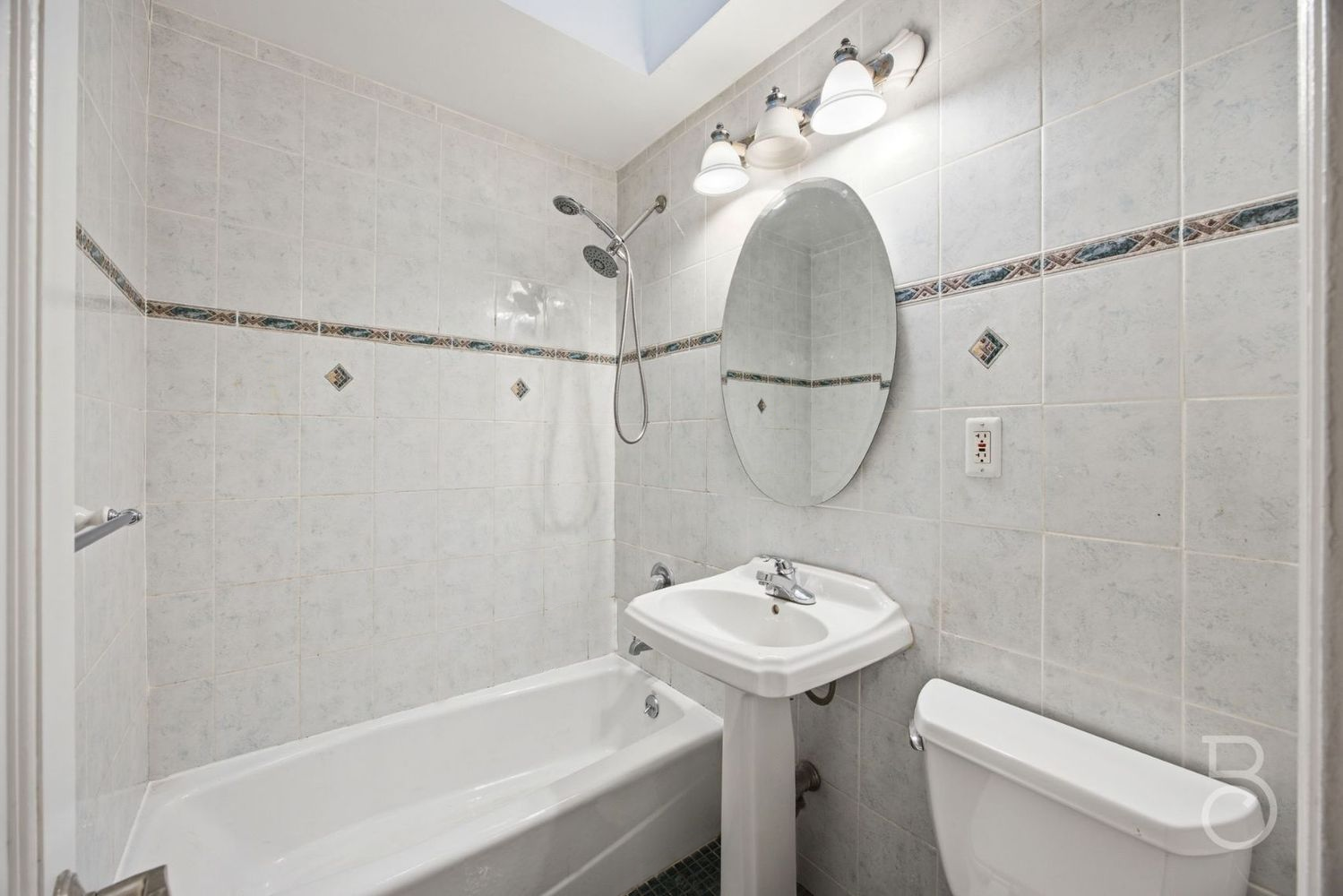 22-61 46th Street Queens, NY 11105 - Photo 11 of 24 a bathroom with a sink toilet and shower