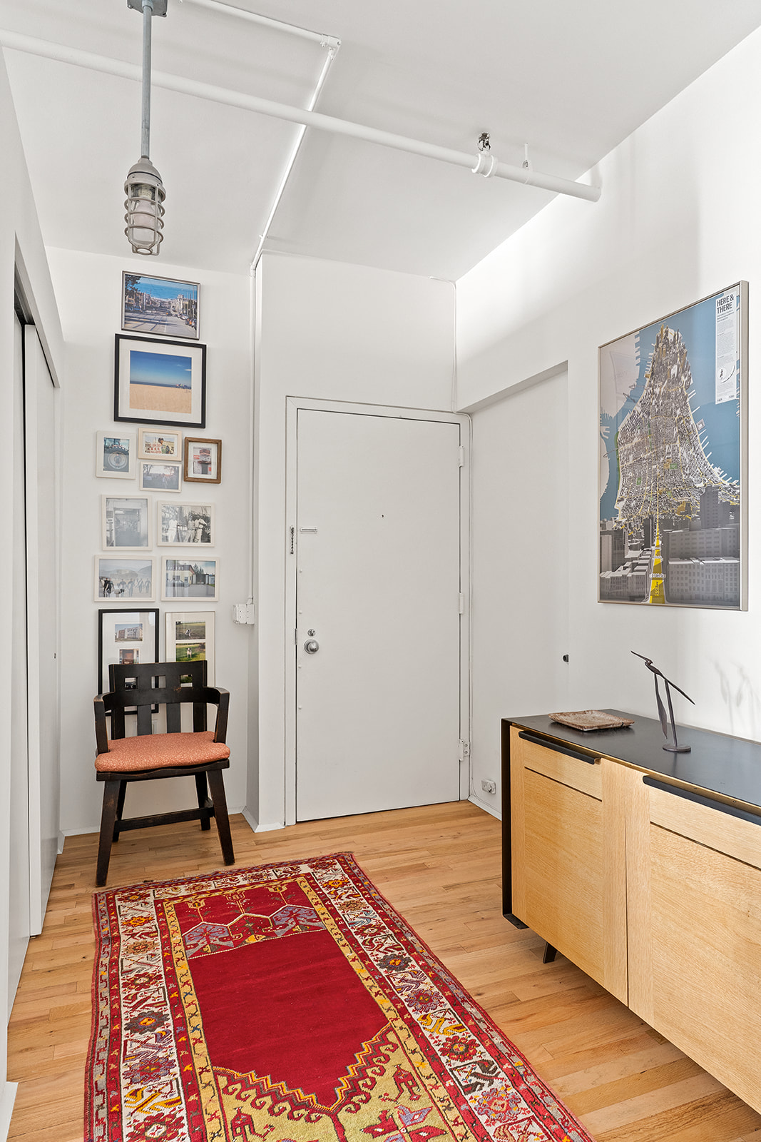 10 Leonard Street, Unit 3N Manhattan, NY 10013 - Photo 8 of 10 a bedroom with a bed and a window