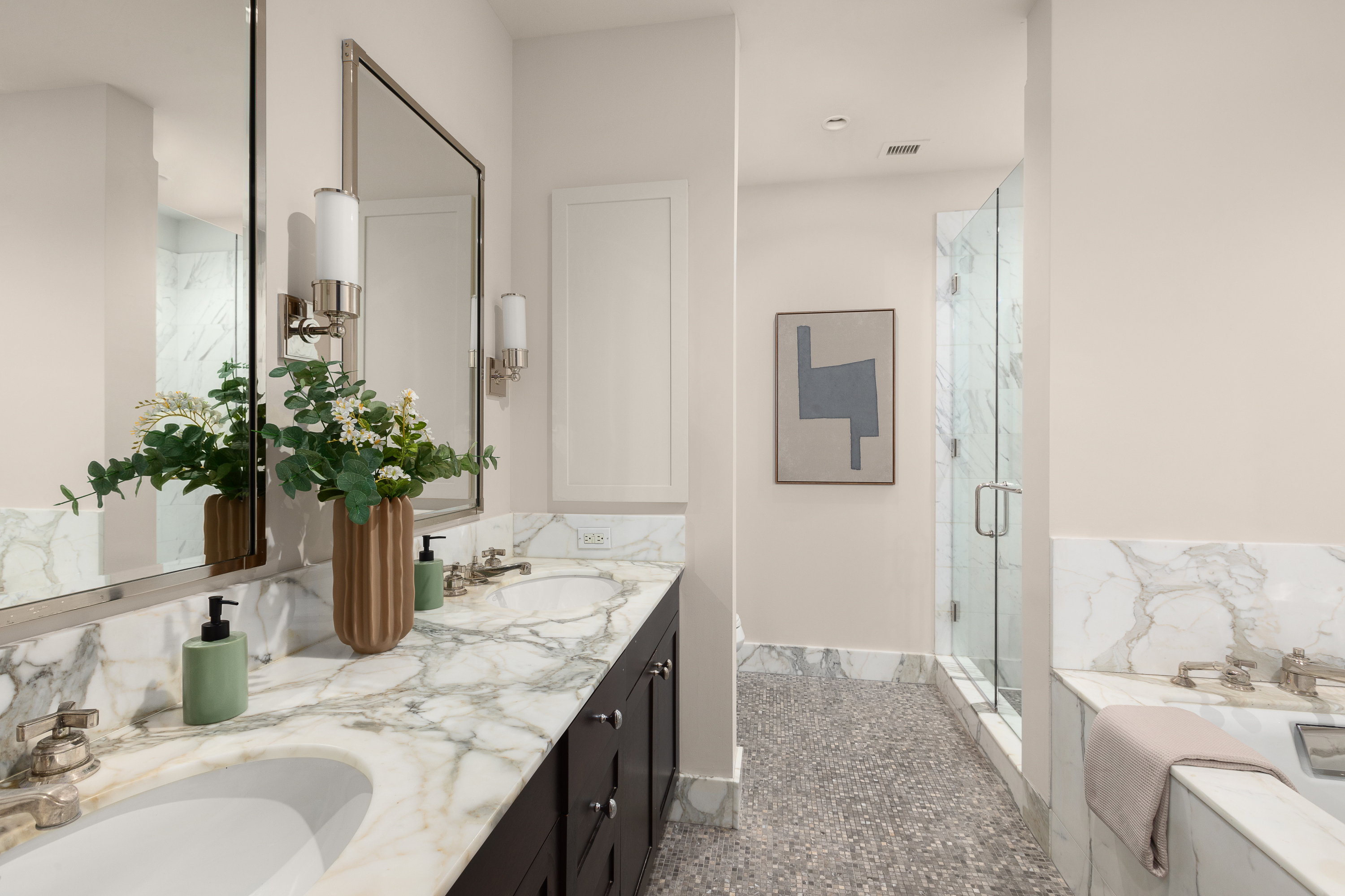 130 West 30th Street, Unit 4C Manhattan, NY 10001 - Photo 7 of 15 a bathroom with a granite countertop sink a toilet and a mirror