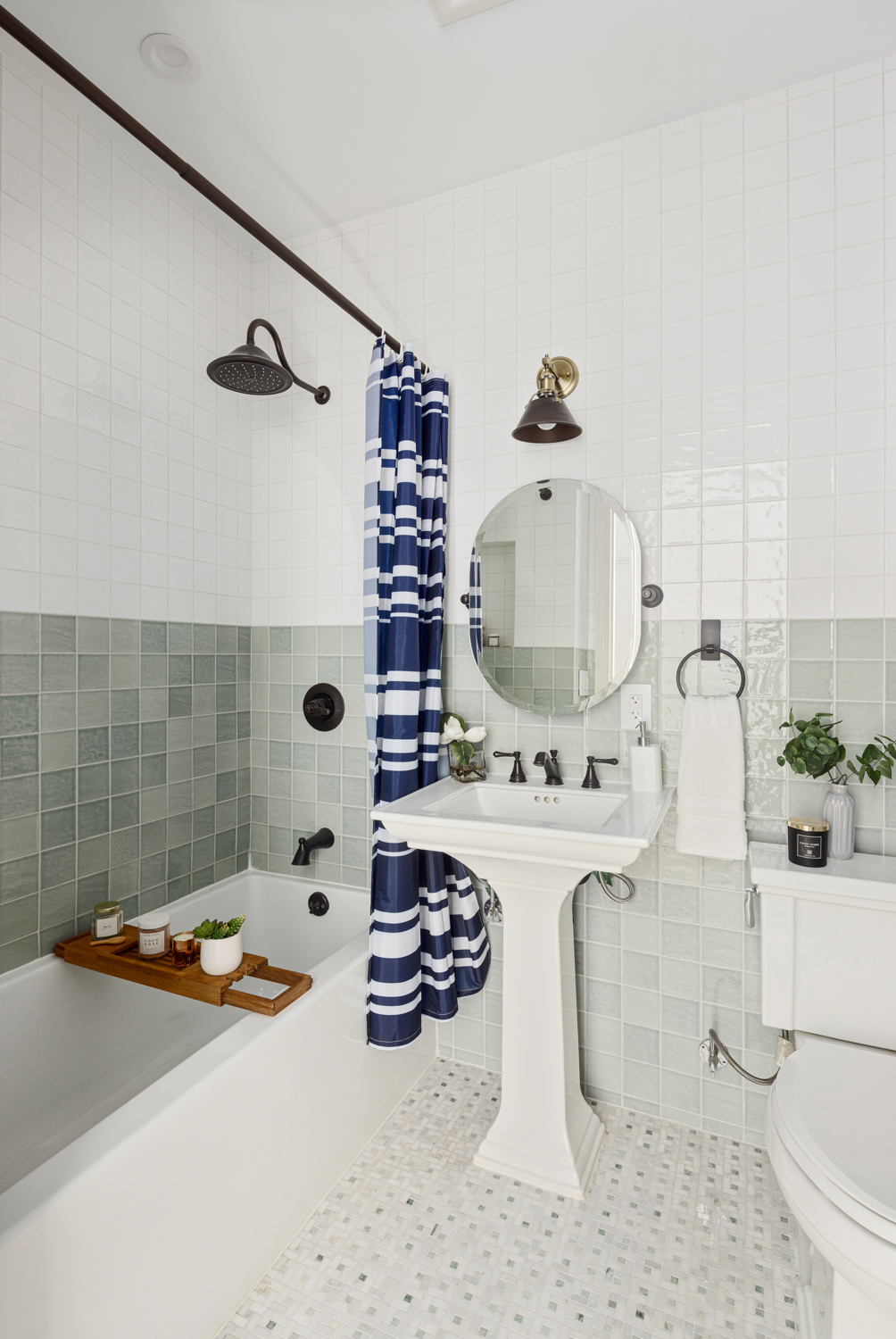 75 8th Avenue, Unit PARLOR Brooklyn, NY 11215 - Photo 13 of 15 a bathroom with a tub sink and mirror
