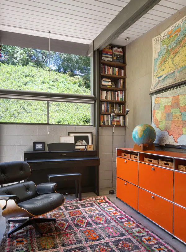 a room with furniture and a window