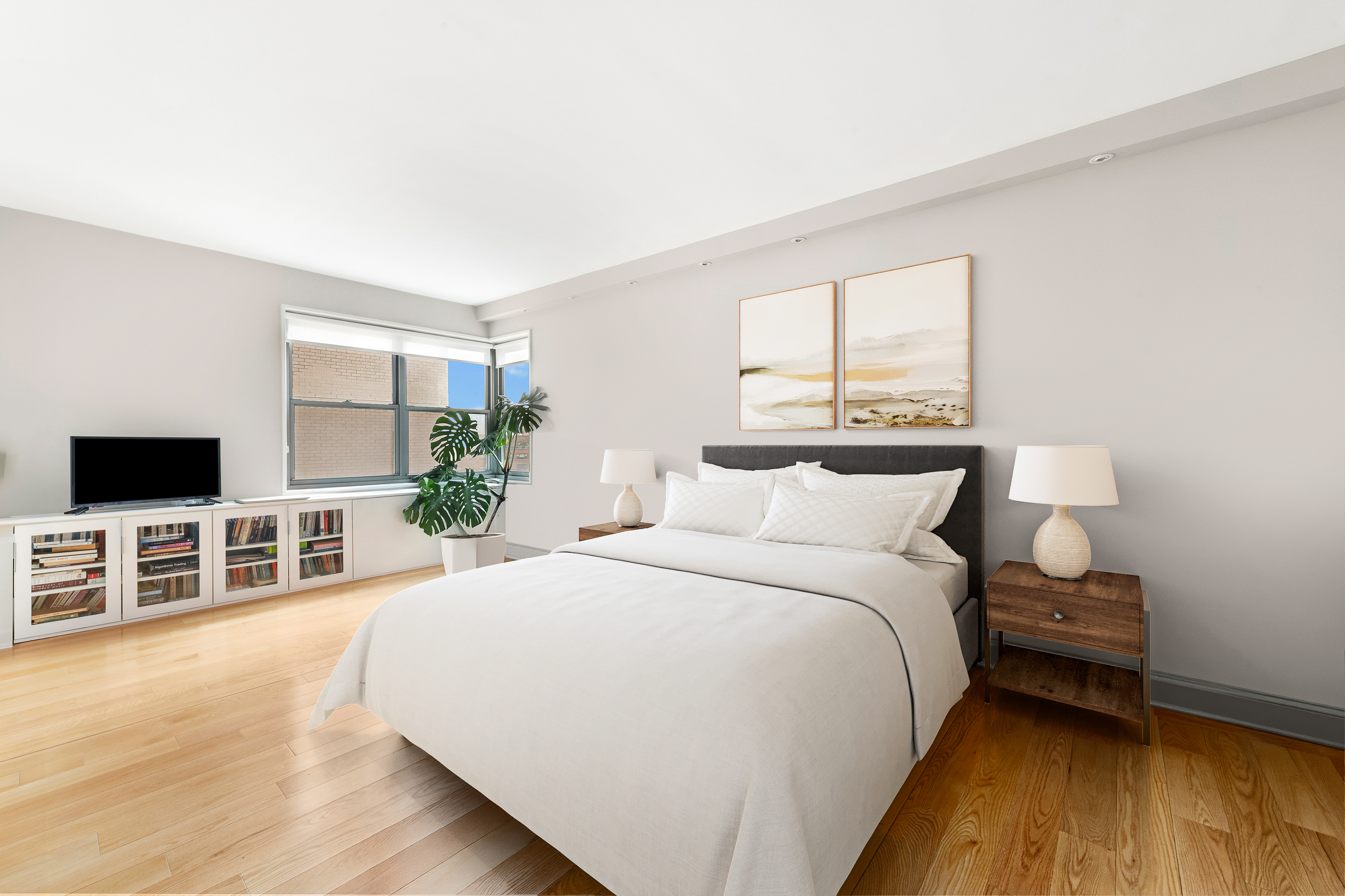 400 East 56th Street, Unit 19O Manhattan, NY 10022 - Photo 9 of 20 a spacious bedroom with a bed and a flat screen tv