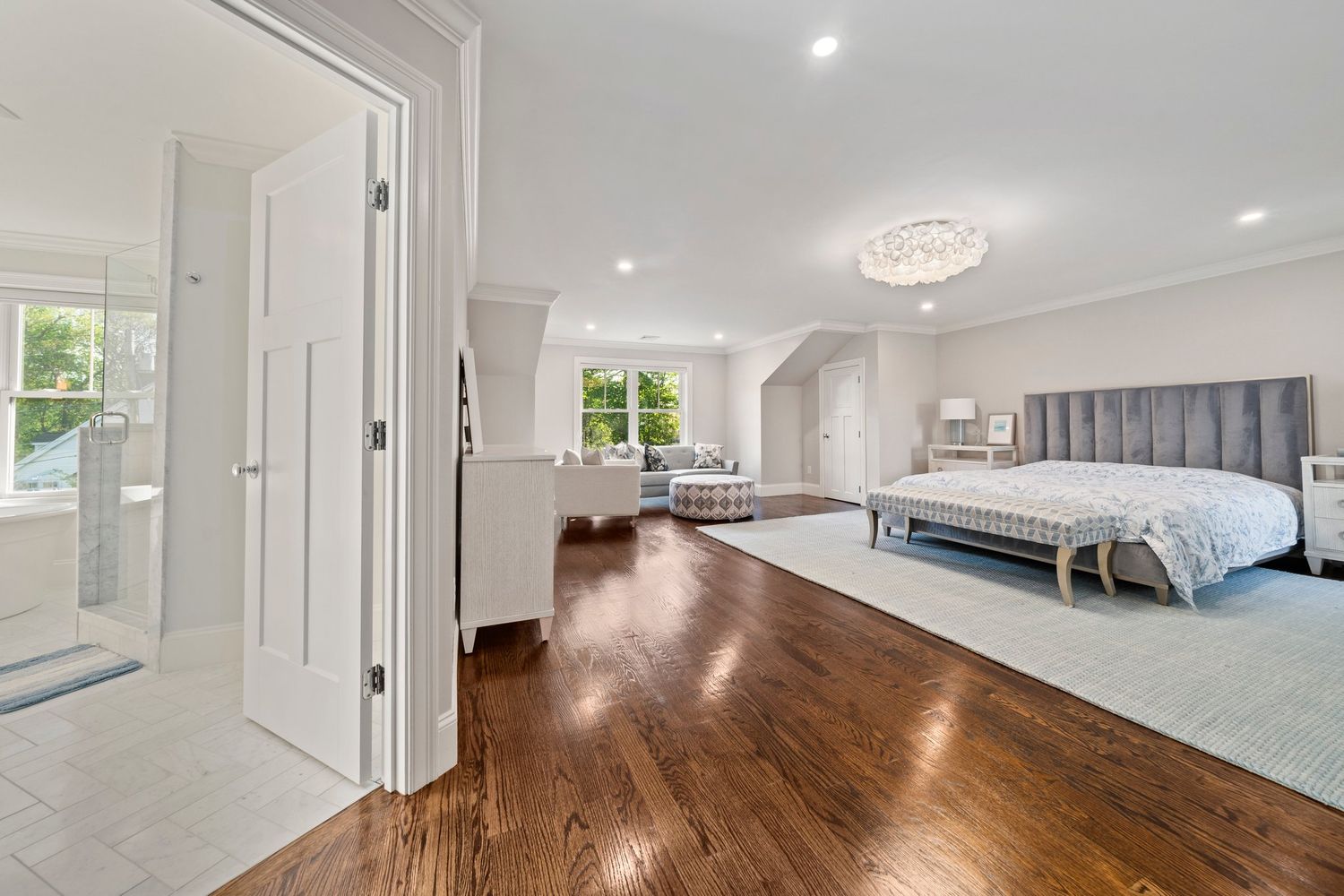 a view of an entryway with wooden floor