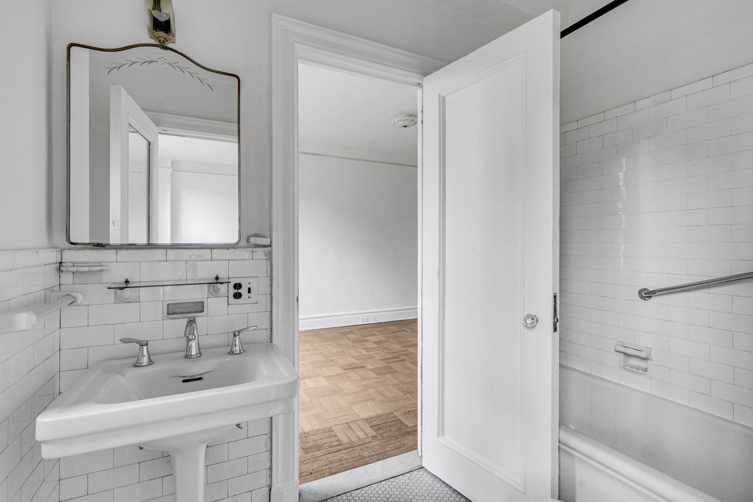 473 West End Avenue, Unit 12A Manhattan, NY 10024 - Photo 15 of 21 a bathroom with a sink mirror and shower