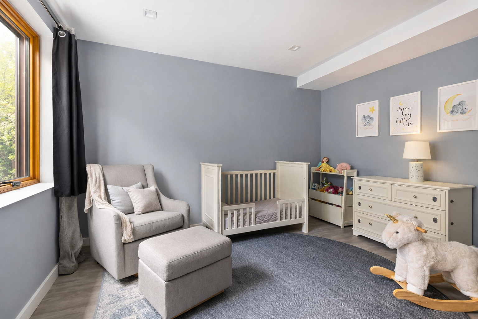 267 Evergreen Avenue, Unit 1 Brooklyn, NY 11221 - Photo 7 of 11 a room with furniture and a window
