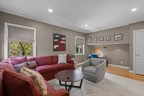 a bedroom with a bed and a couch