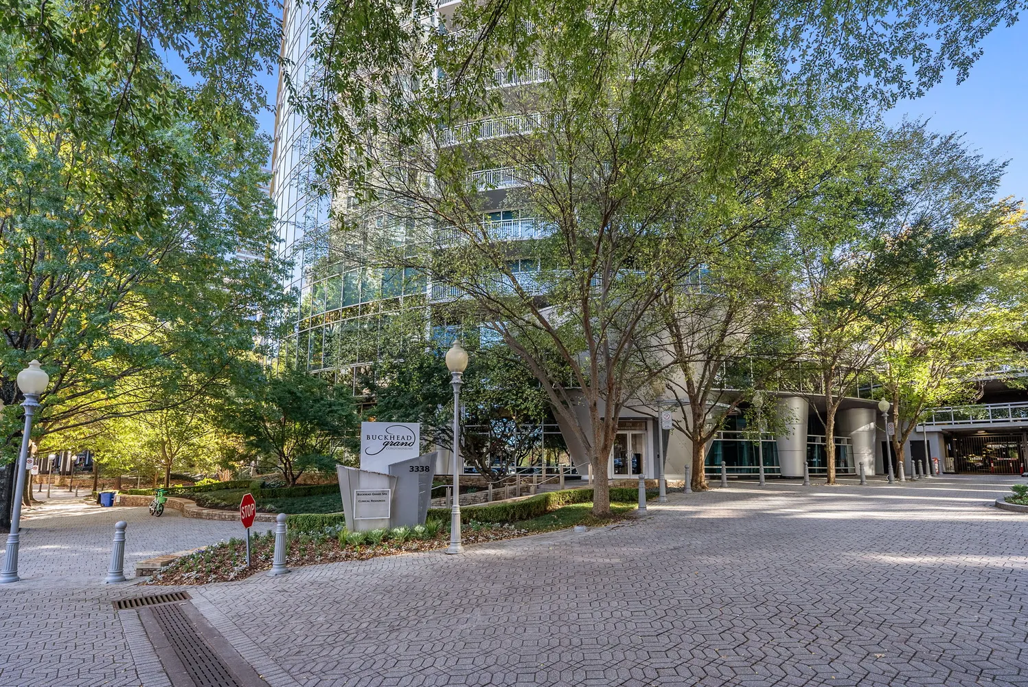 a view of a living room with furniture and a flat screen tv