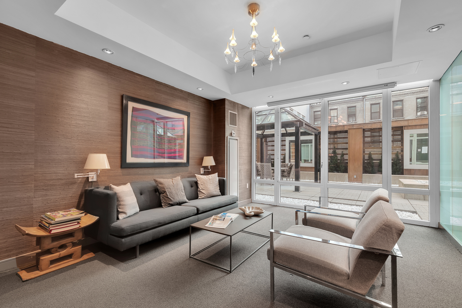 207 East 57th Street, Unit 25B Manhattan, NY 10022 - Photo 17 of 19 a living room with furniture and a large window