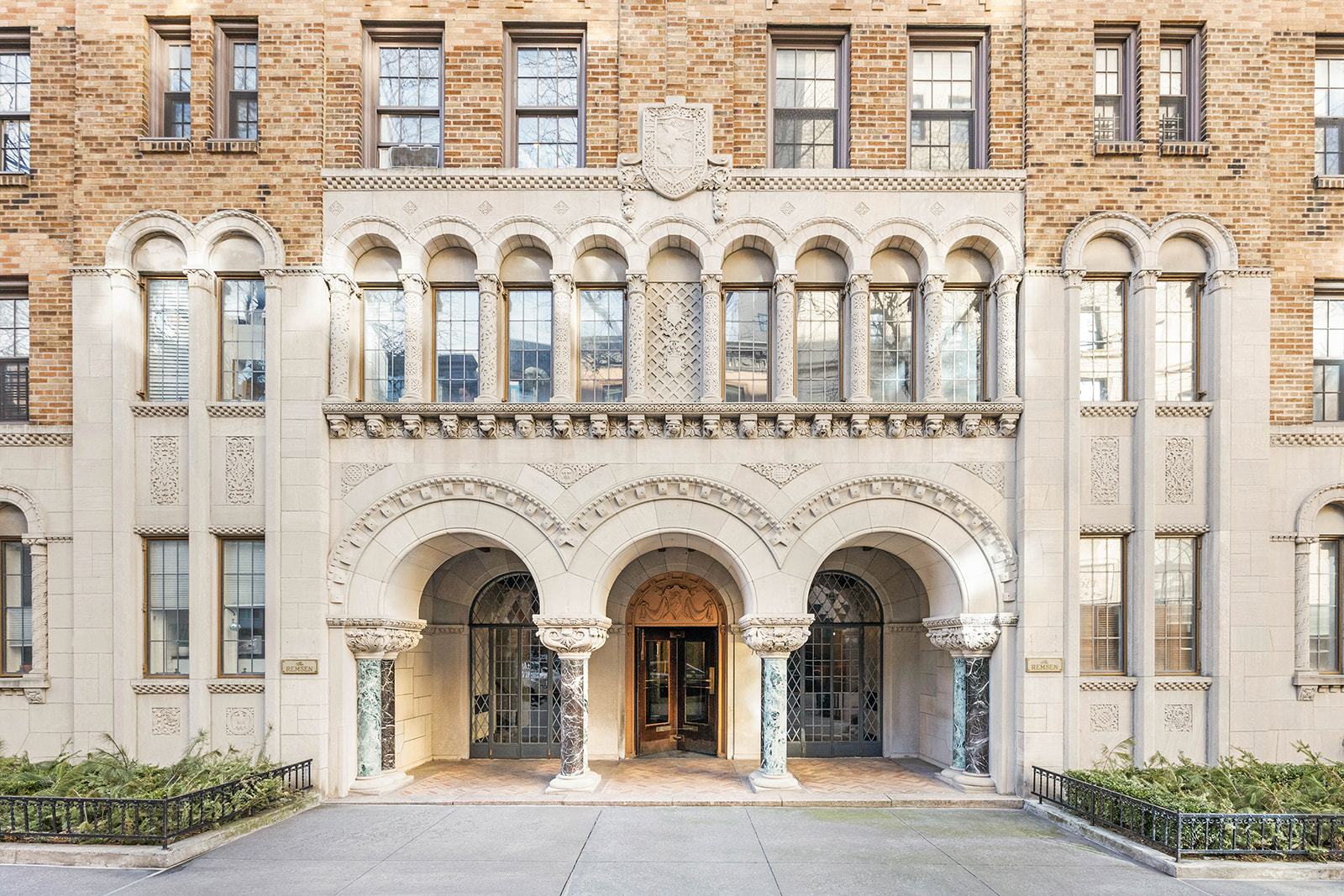 70 Remsen Street, Unit 9C Brooklyn, NY 11201 - Photo 10 of 11 a front view of a building with many windows