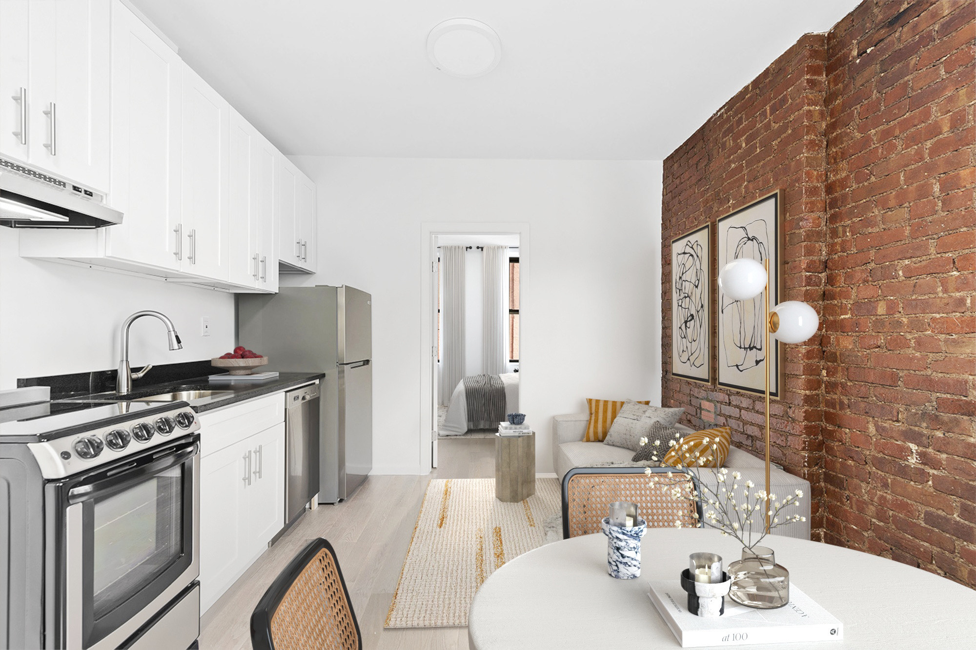 117 Mulberry Street, Unit 9 Manhattan, NY 10013 - Photo 3 of 5 a kitchen with stainless steel appliances a stove a sink dishwasher and white cabinets with wooden floor