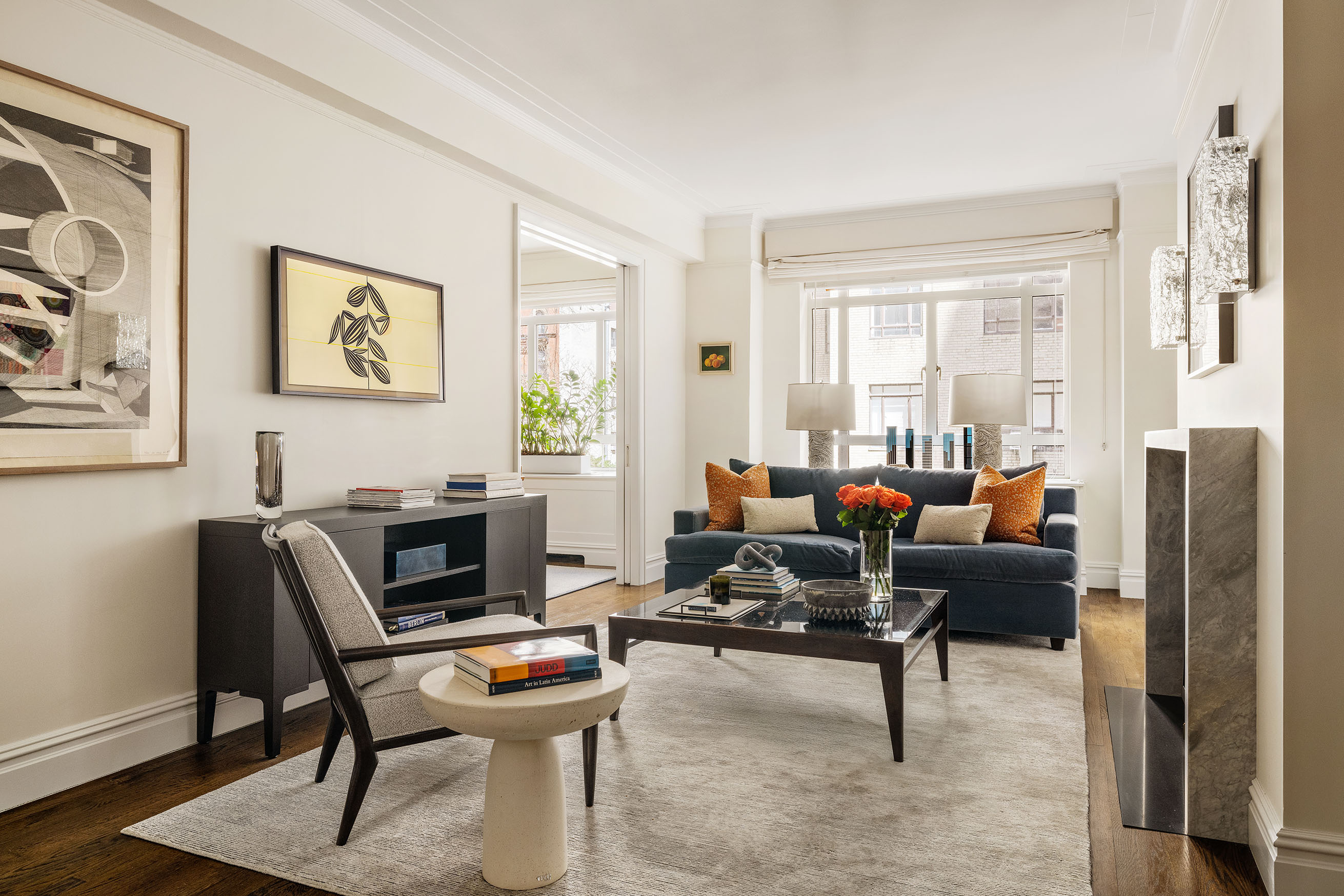 25 Central Park West, Unit 3A Manhattan, NY 10023 - Photo 1 of 11 a living room with furniture and a window