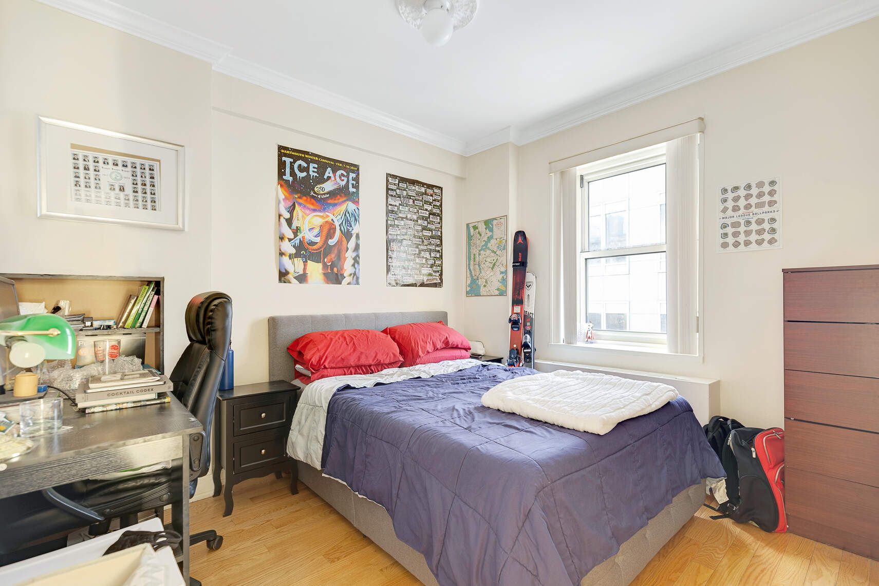 159 West 53rd Street, Unit 18B Manhattan, NY 10019 - Photo 7 of 11 a bedroom with a bed and a desk