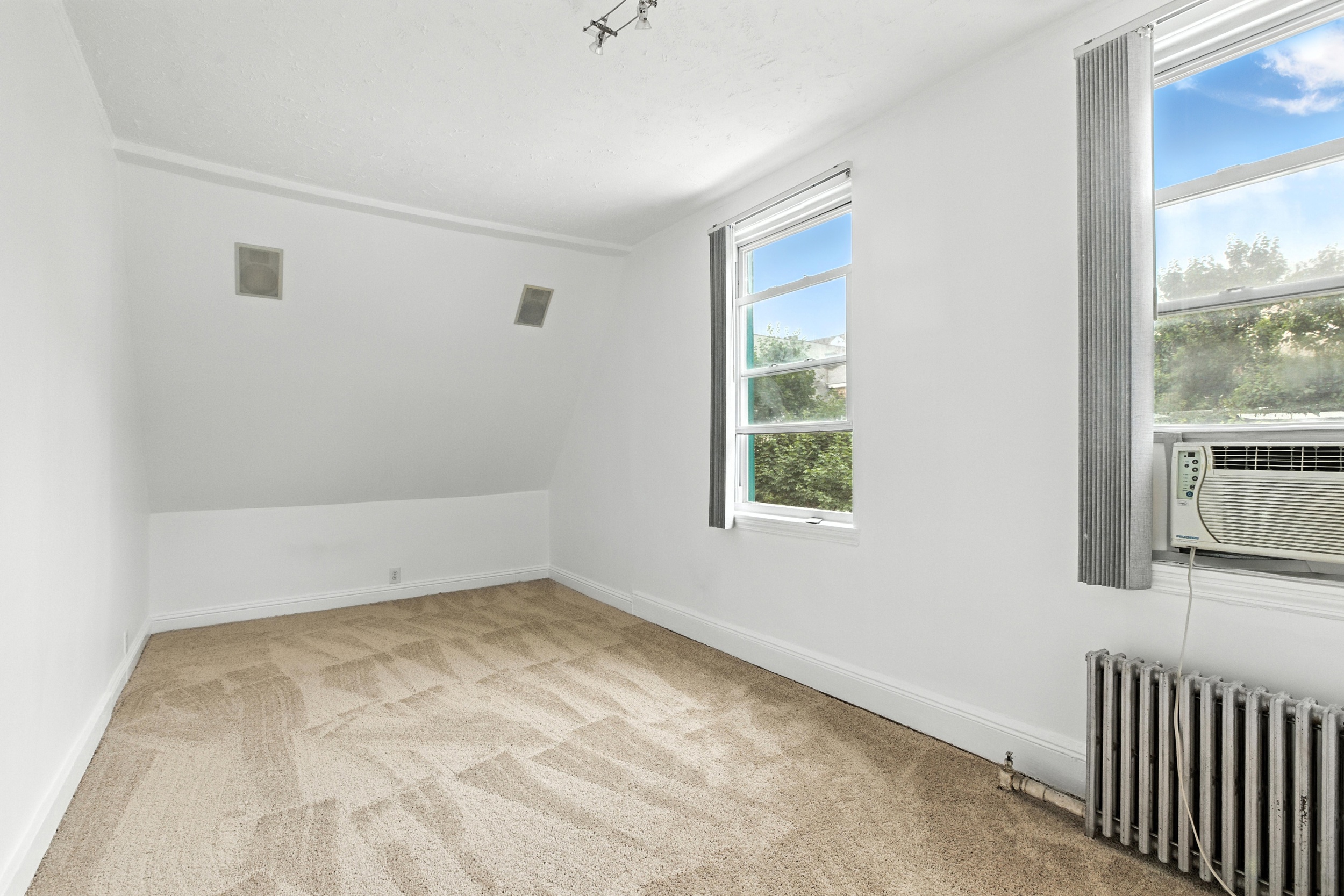 1070 East 13th Street Brooklyn, NY 11230 - Photo 12 of 18 an empty room with a window