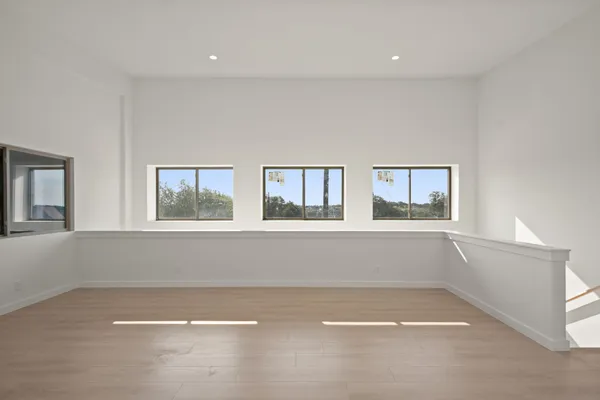 an empty room with windows