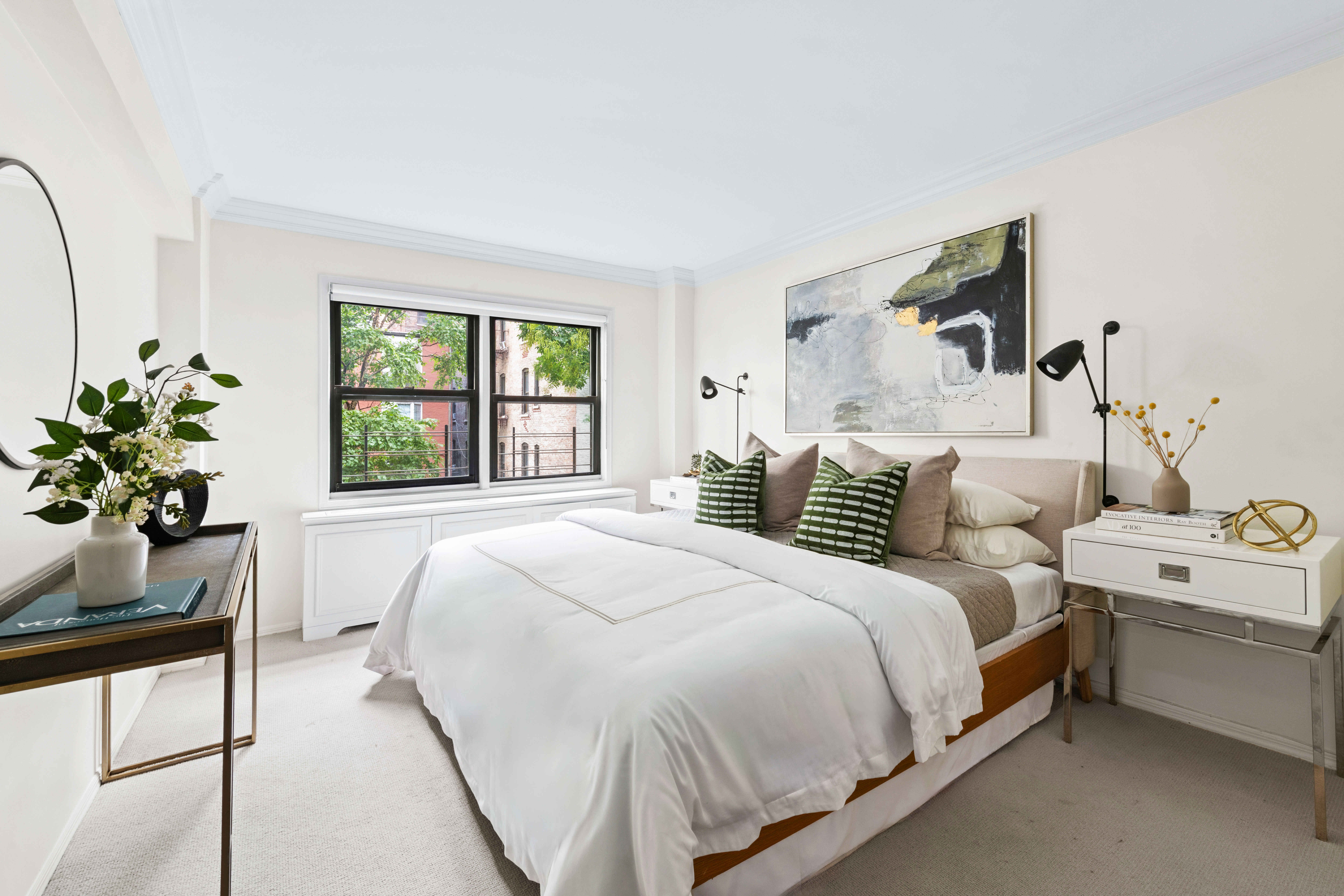 205 East 77th Street, Unit 3A Manhattan, NY 10075 - Photo 4 of 9 a bedroom with a bed and a window