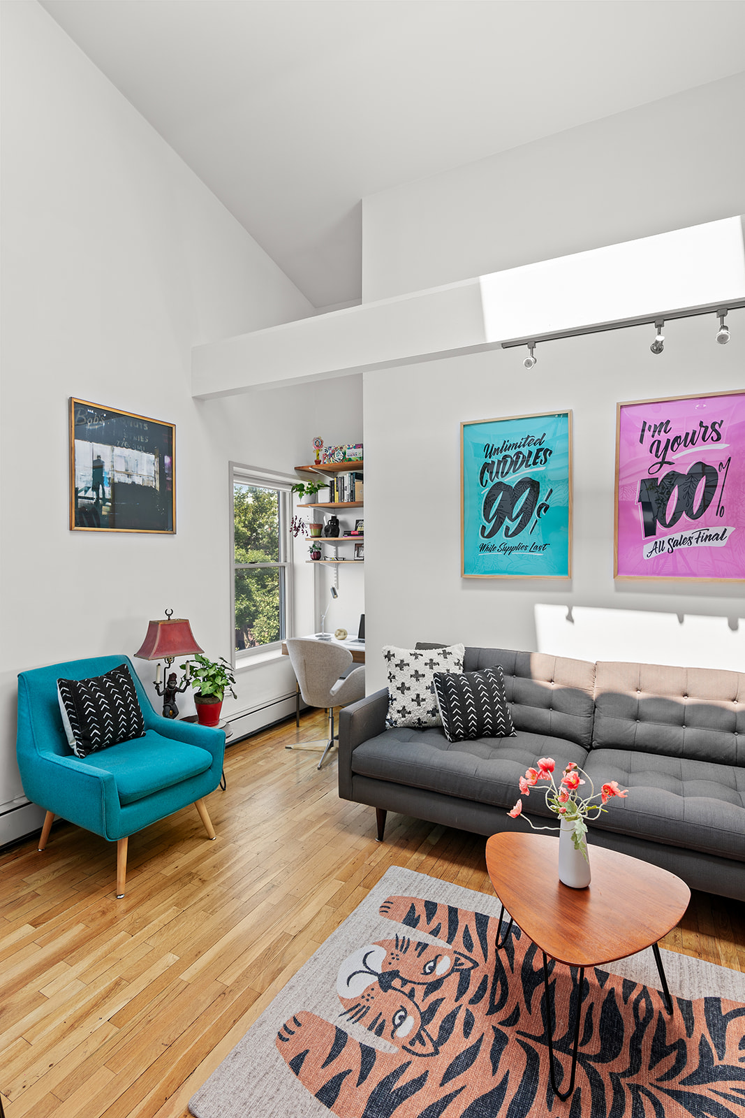 57 3rd Street, Unit 7 Brooklyn, NY 11231 - Photo 3 of 13 a living room with furniture and a rug