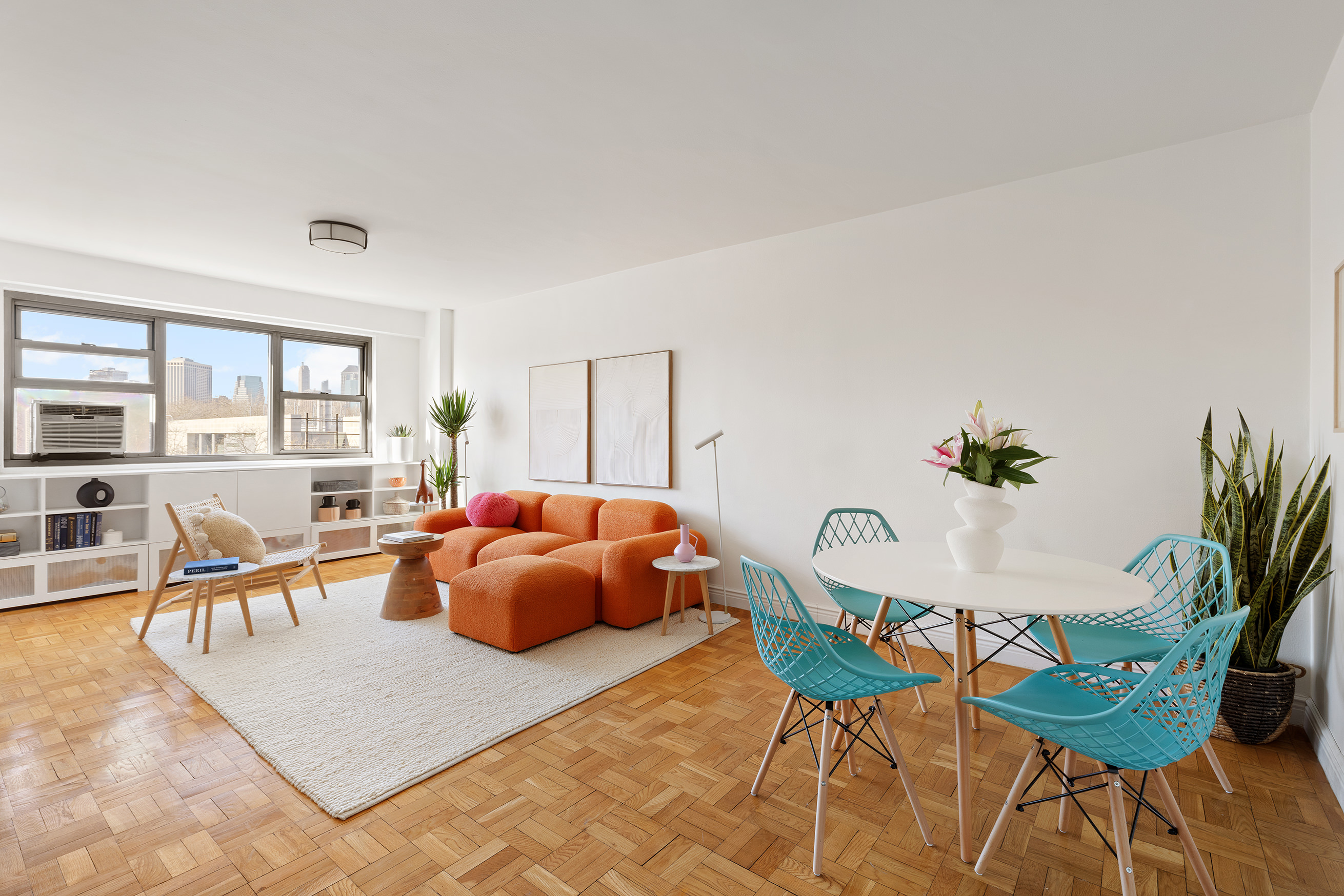175 Adams Street, Unit 7A Brooklyn, NY 11201 - Photo 5 of 10 a living room with furniture potted plant and a window
