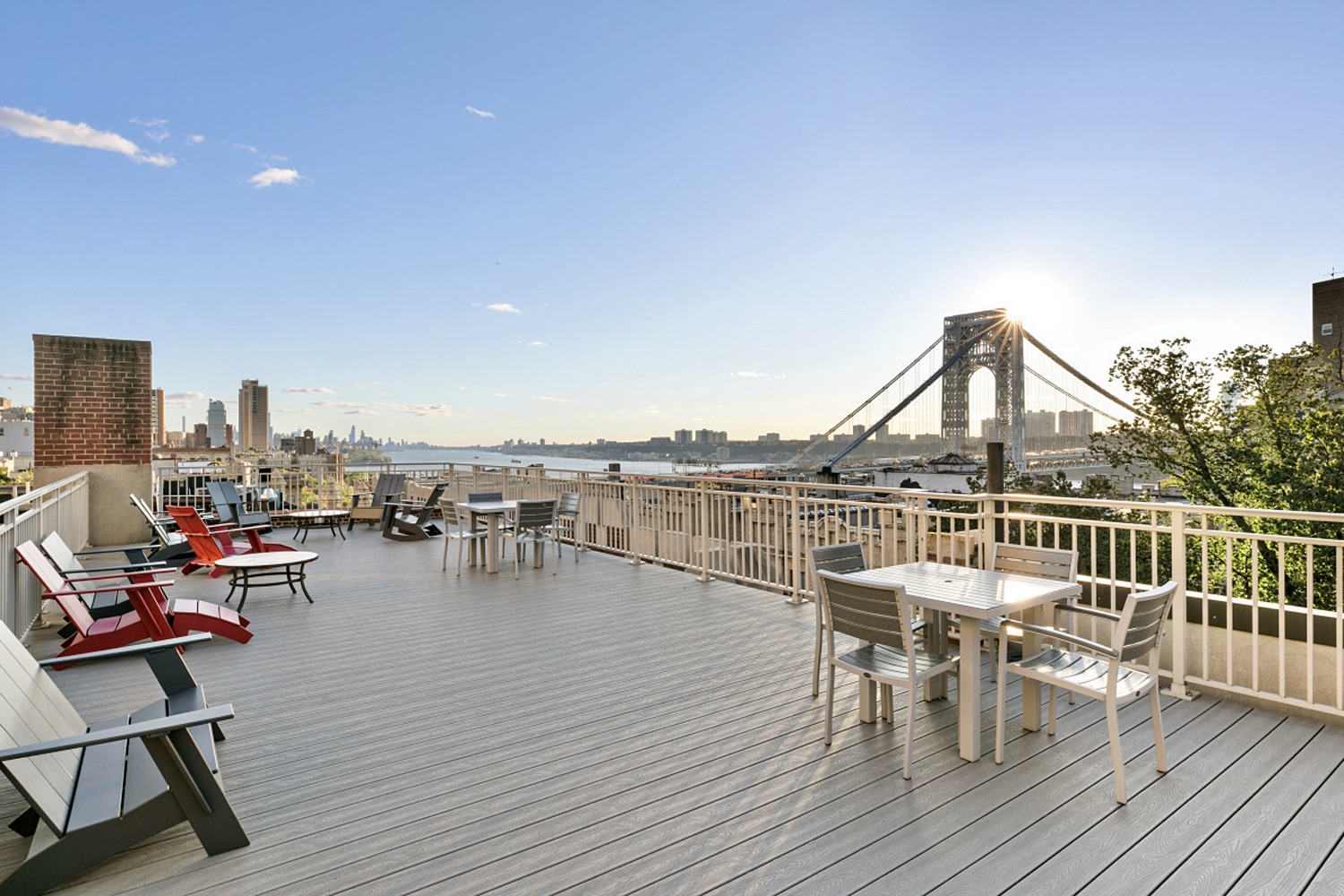 125 Cabrini Boulevard, Unit A52 Manhattan, NY 10033 - Photo 17 of 20 a view of a balcony with chairs and wooden floor
