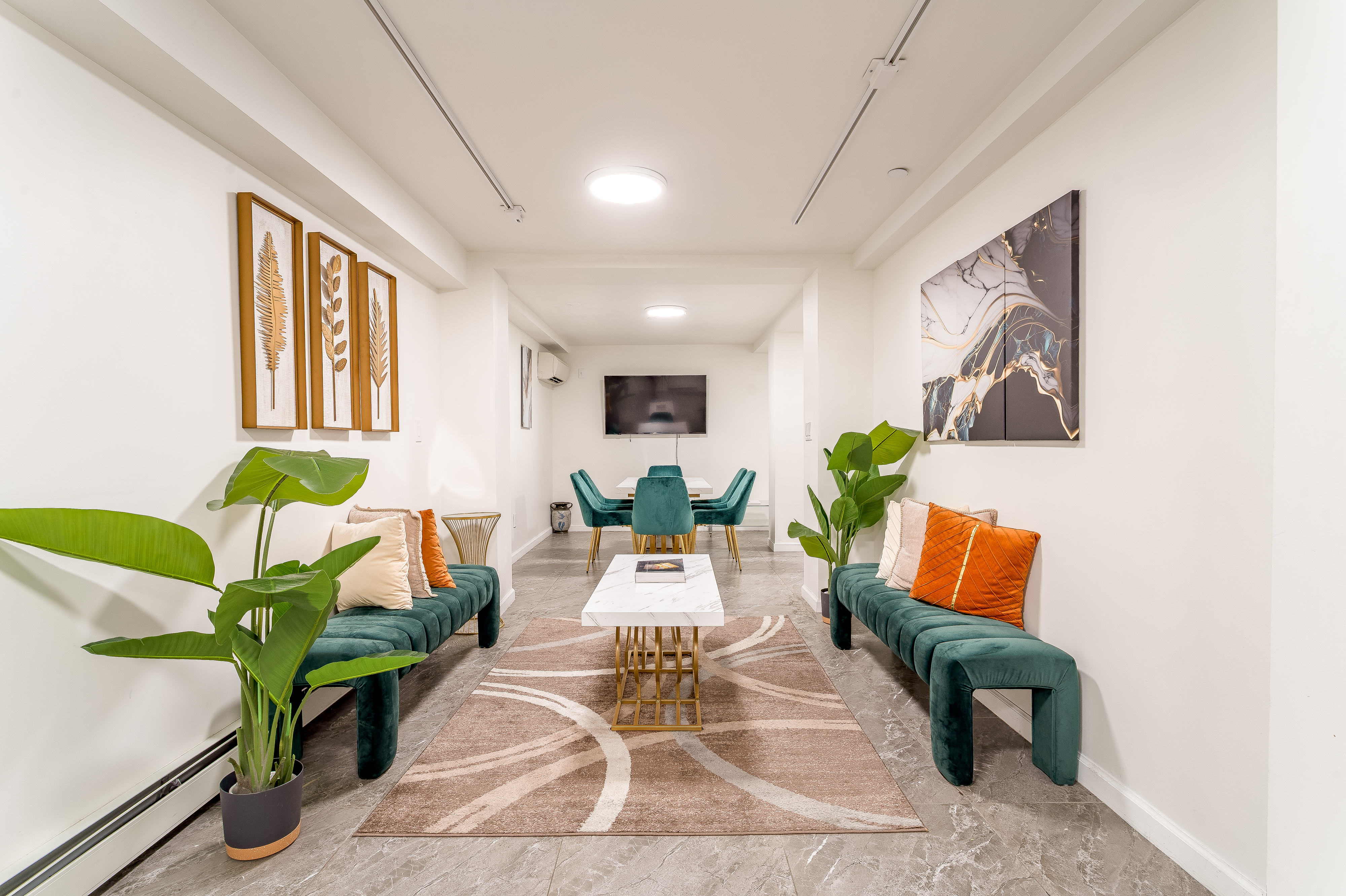 212 East 70th Street, Unit B Manhattan, NY 10021 - Photo 2 of 17 a living room with patio furniture and a potted plant