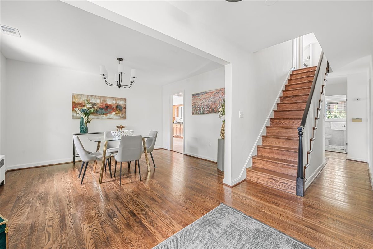 1902 Rookwood Road Silver Spring, MD 20910 - Photo 7 of 36 a view of a dining room with furniture and wooden floor