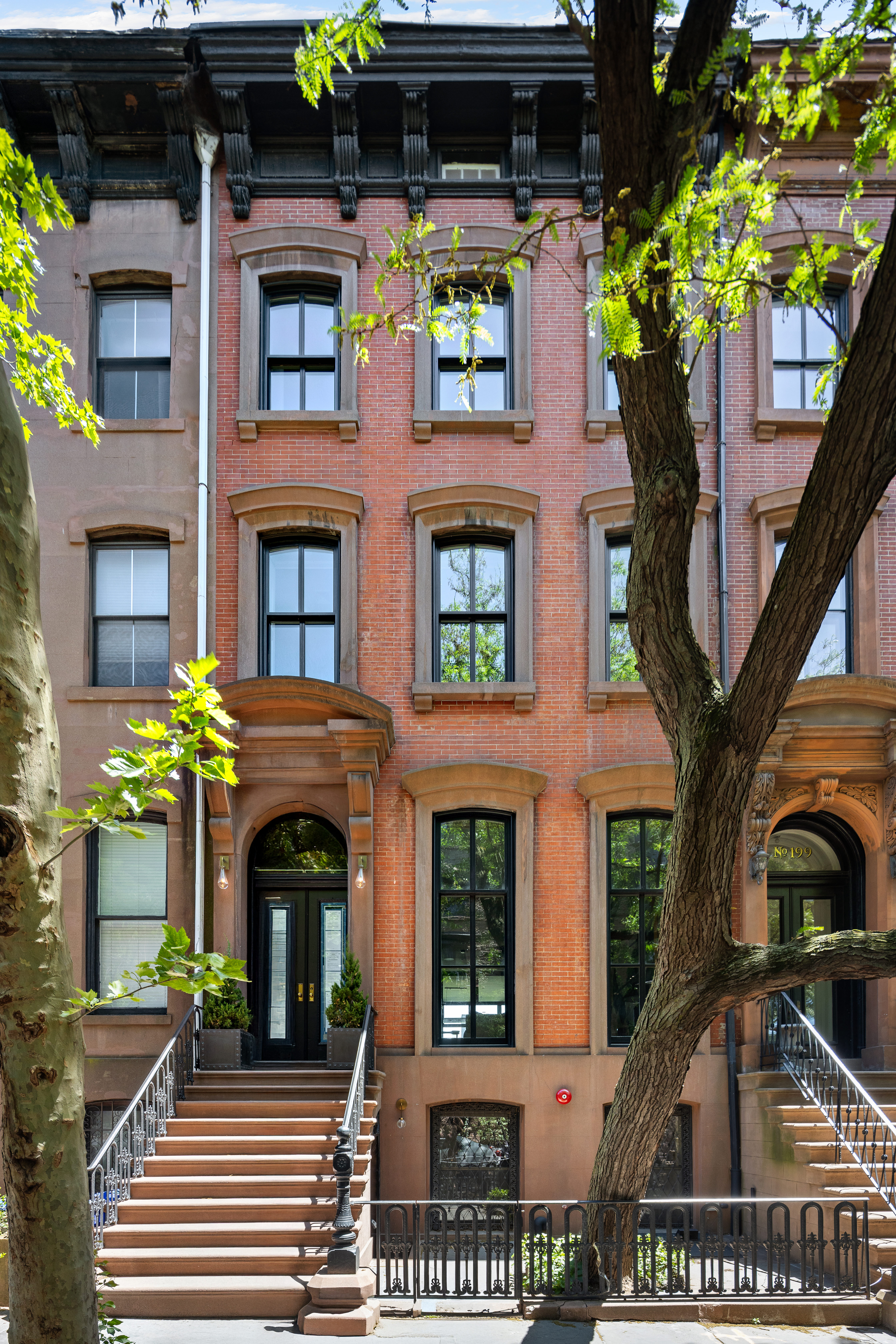 a front view of multi story residential apartment building