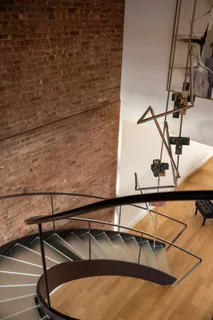 a bathroom with a bathtub and a window