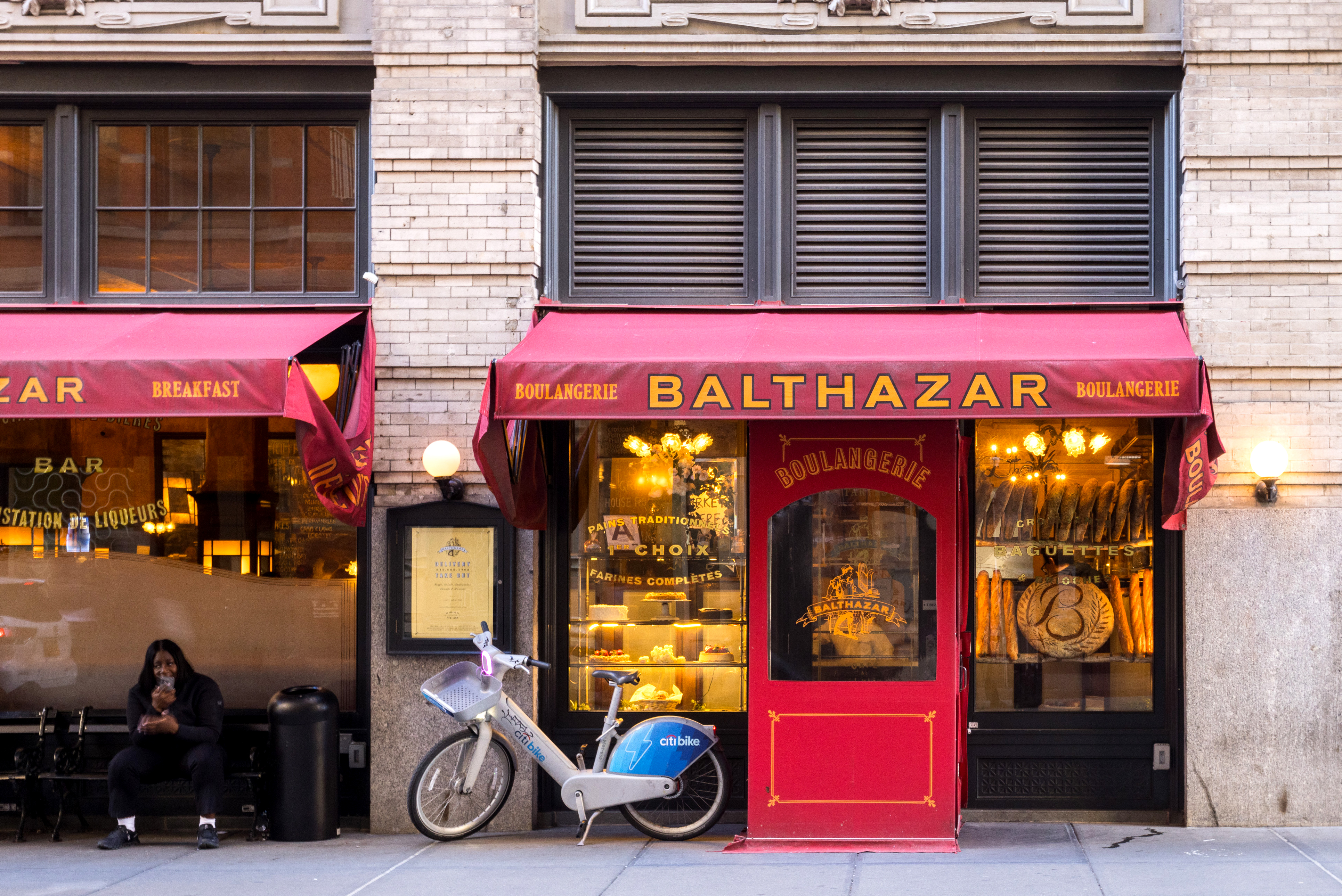 76 Crosby Street, Unit 2B Manhattan, NY 10012 - Photo 16 of 17 a front view of a building with cars parked