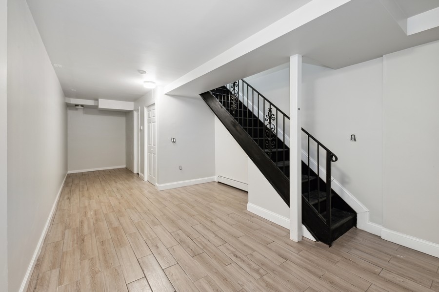 189 Woodpoint Road Brooklyn, NY 11211 - Photo 10 of 21 a view of entryway with wooden floor