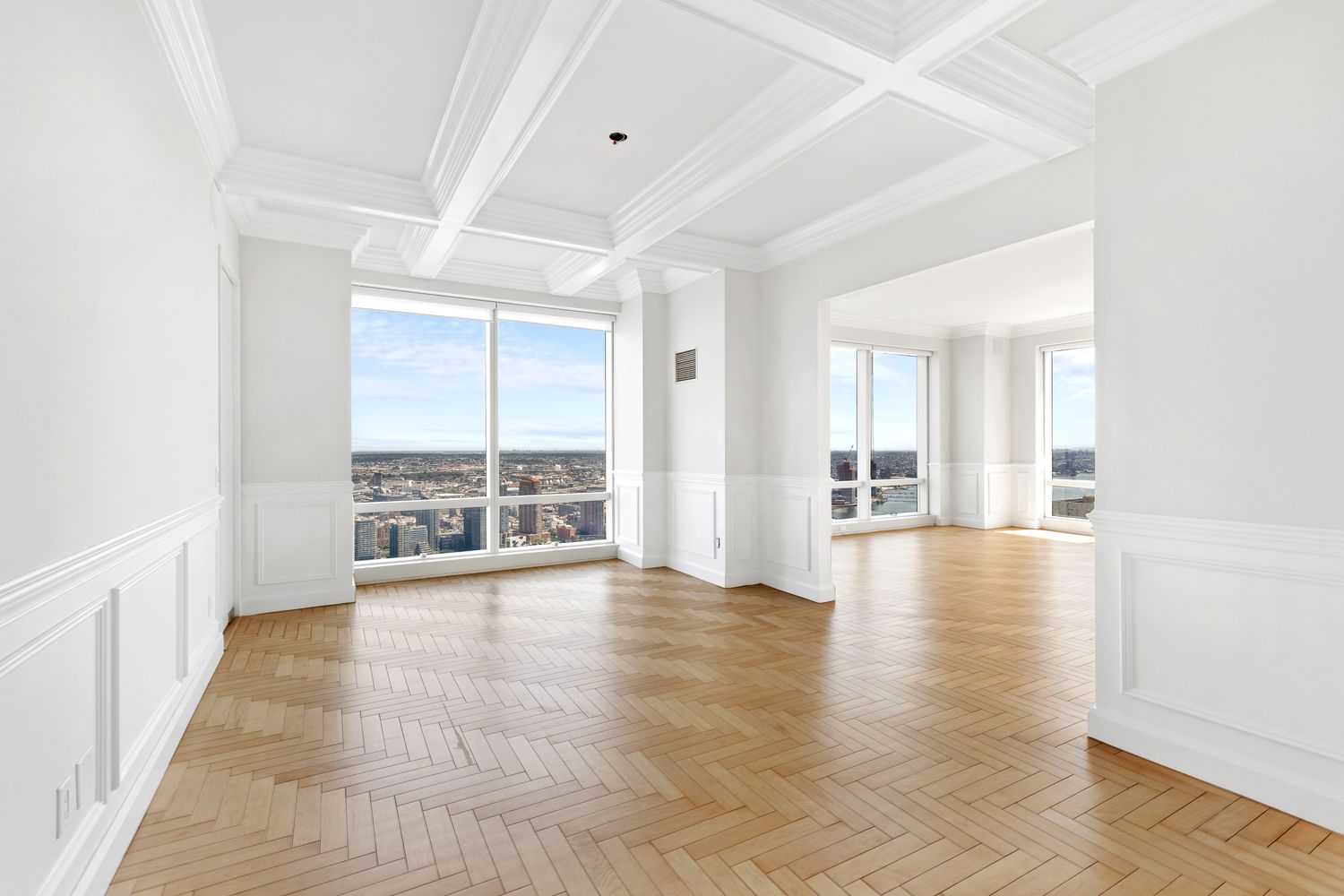 845 United Nations Plaza, Unit 63B Manhattan, NY 10017 - Photo 5 of 14 a view of an empty room with glass door