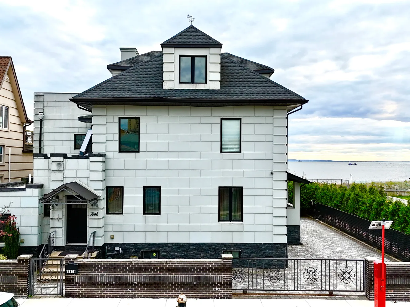 a front view of a house with a yard