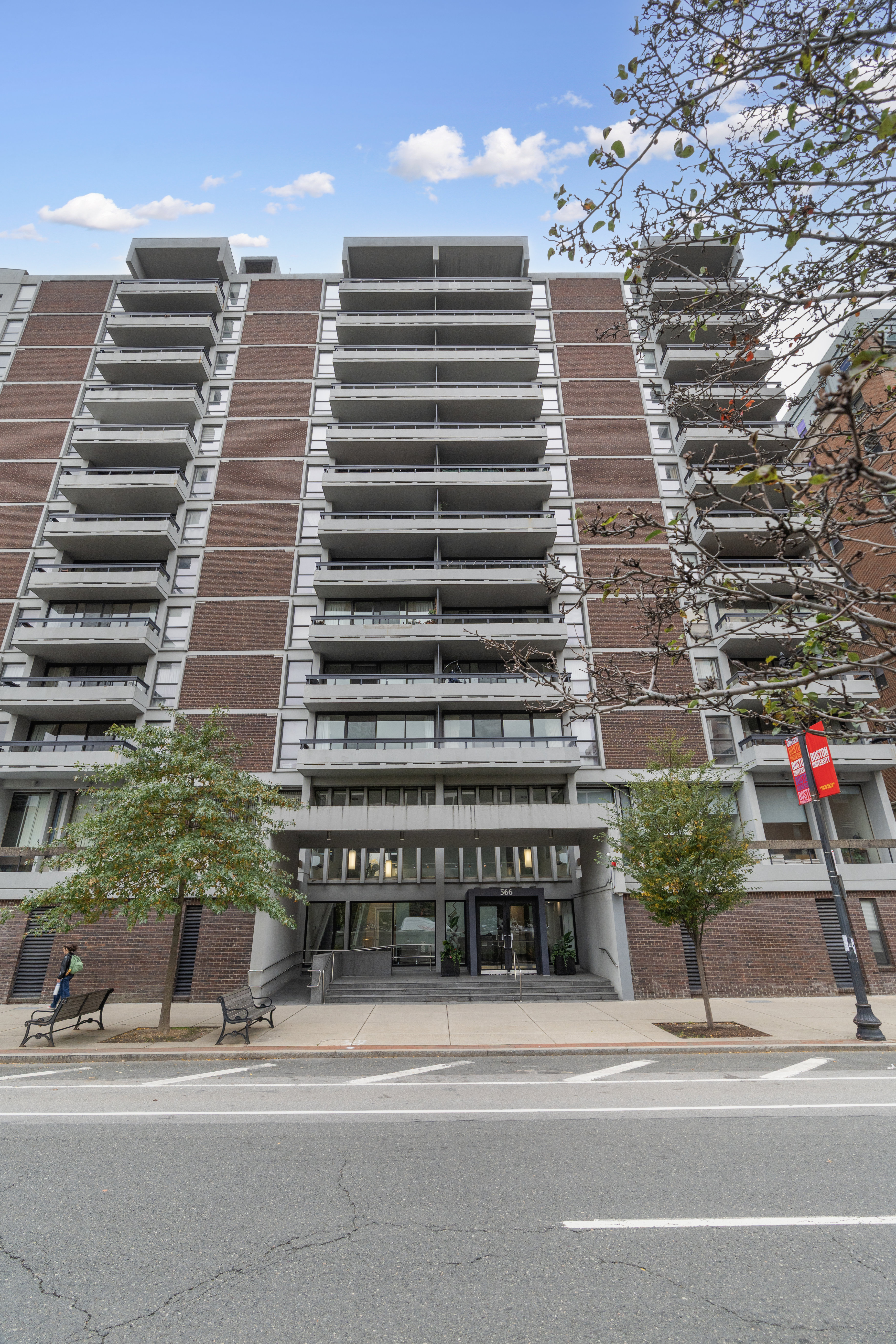 566 Commonwealth Avenue, Unit 1100 Boston, MA 02215 - Photo 13 of 13 a tall building sitting on the side of a street