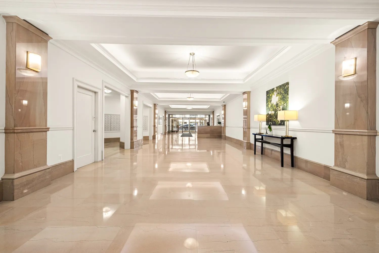 a view of a livingroom with furniture and a window