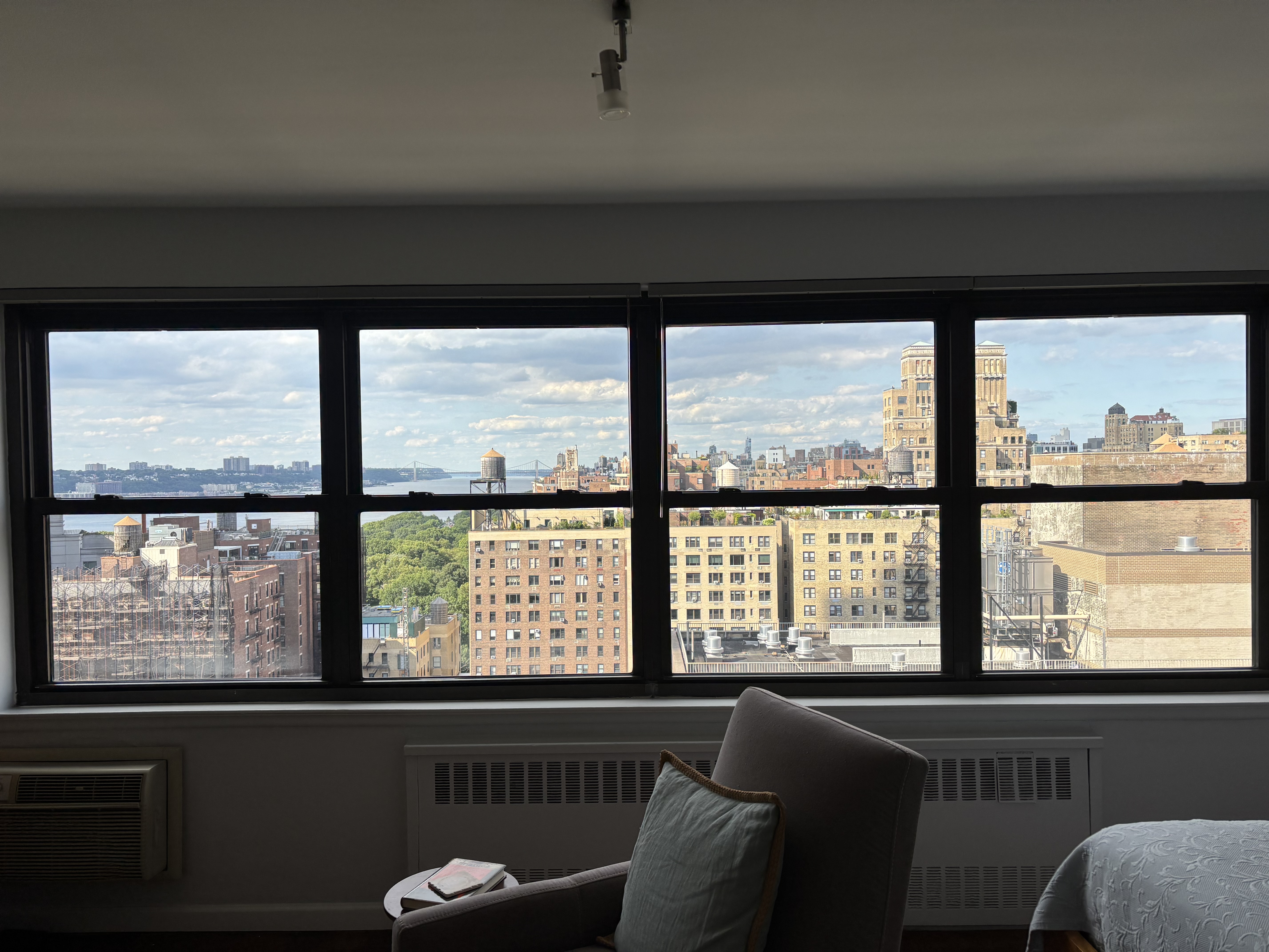 205 West End Avenue, Unit 23E Manhattan, NY 10023 - Photo 8 of 15 a view of a living room and a large window