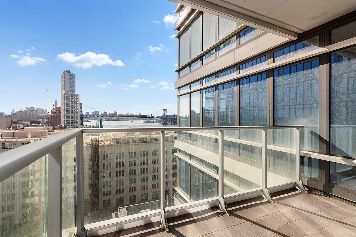 a view of a building from a balcony