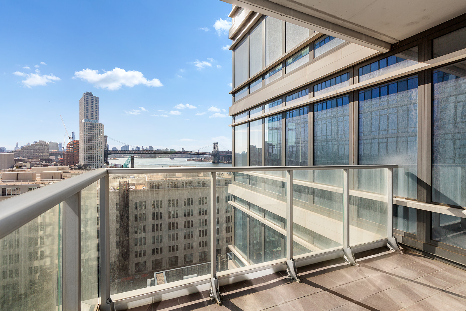 2 Northside Piers, Unit 17F Brooklyn, NY 11249 - Photo 2 of 11 a view of a building from a balcony