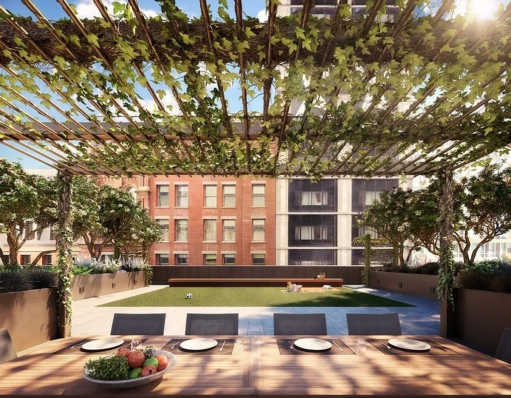 25 Park Row, Unit 11B Manhattan, NY 10038 - Photo 8 of 15 a swimming pool with outdoor seating and yard