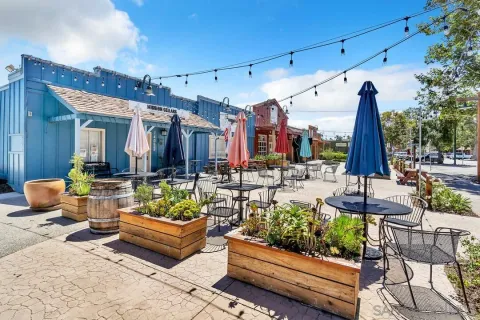 a view of a building with sitting area