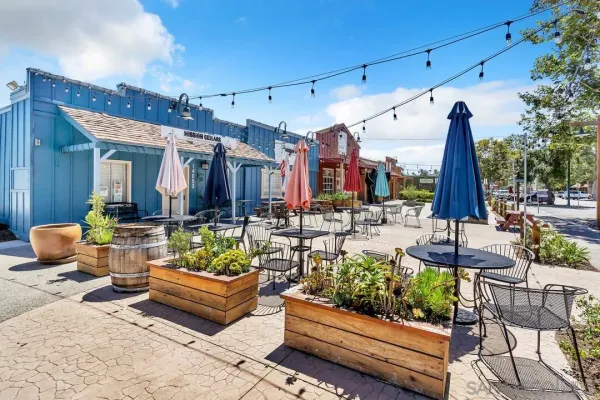 a view of a building with sitting area