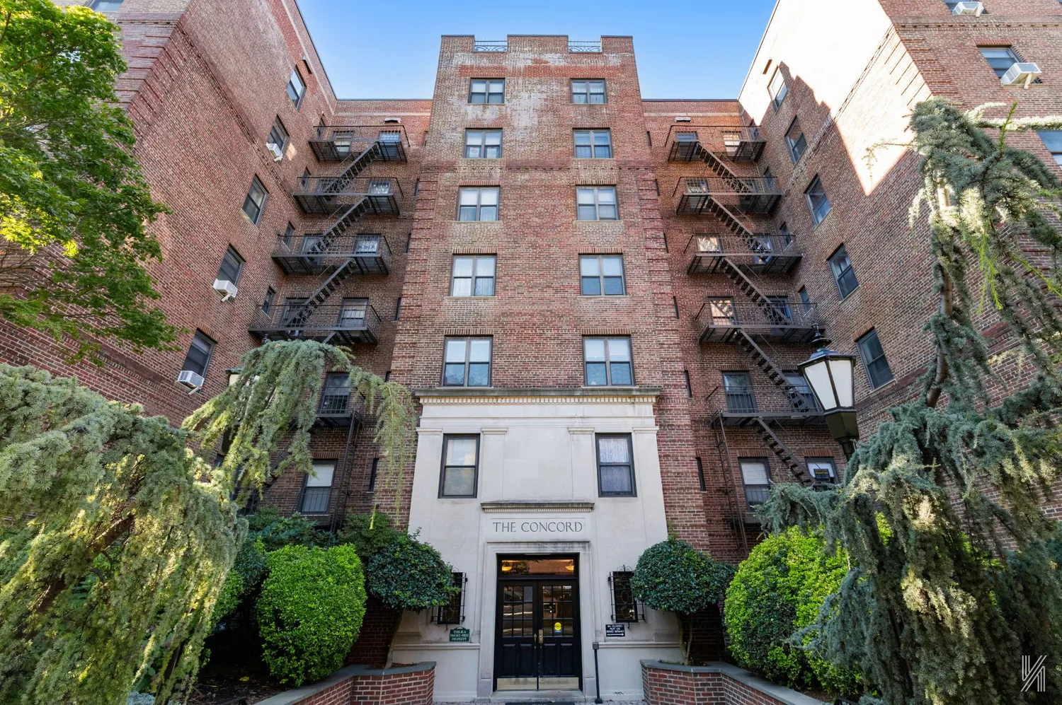 a large building with a clock on the side of it