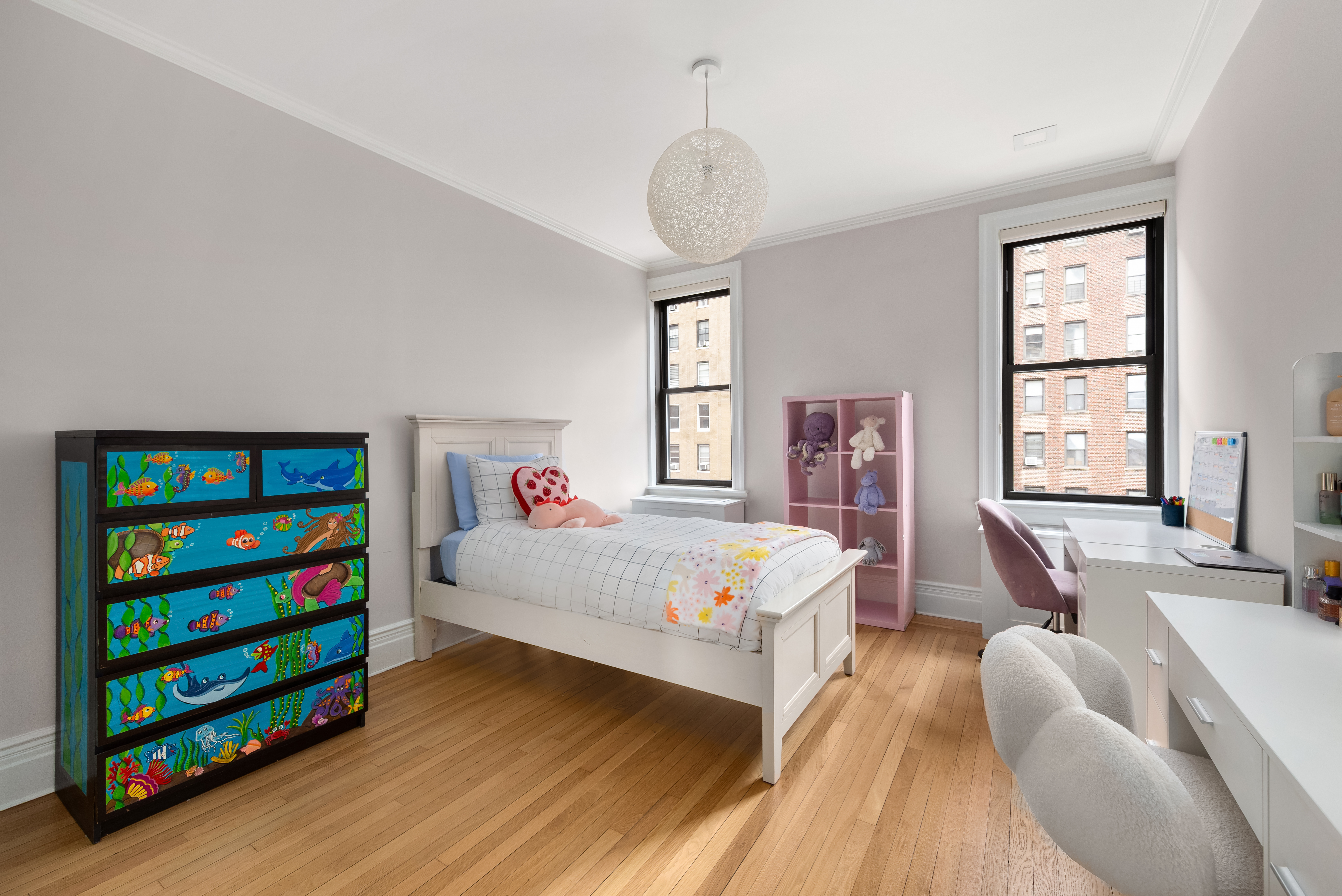 905 West End Avenue, Unit 81 Manhattan, NY 10025 - Photo 7 of 14 a bedroom with a bed couch and window