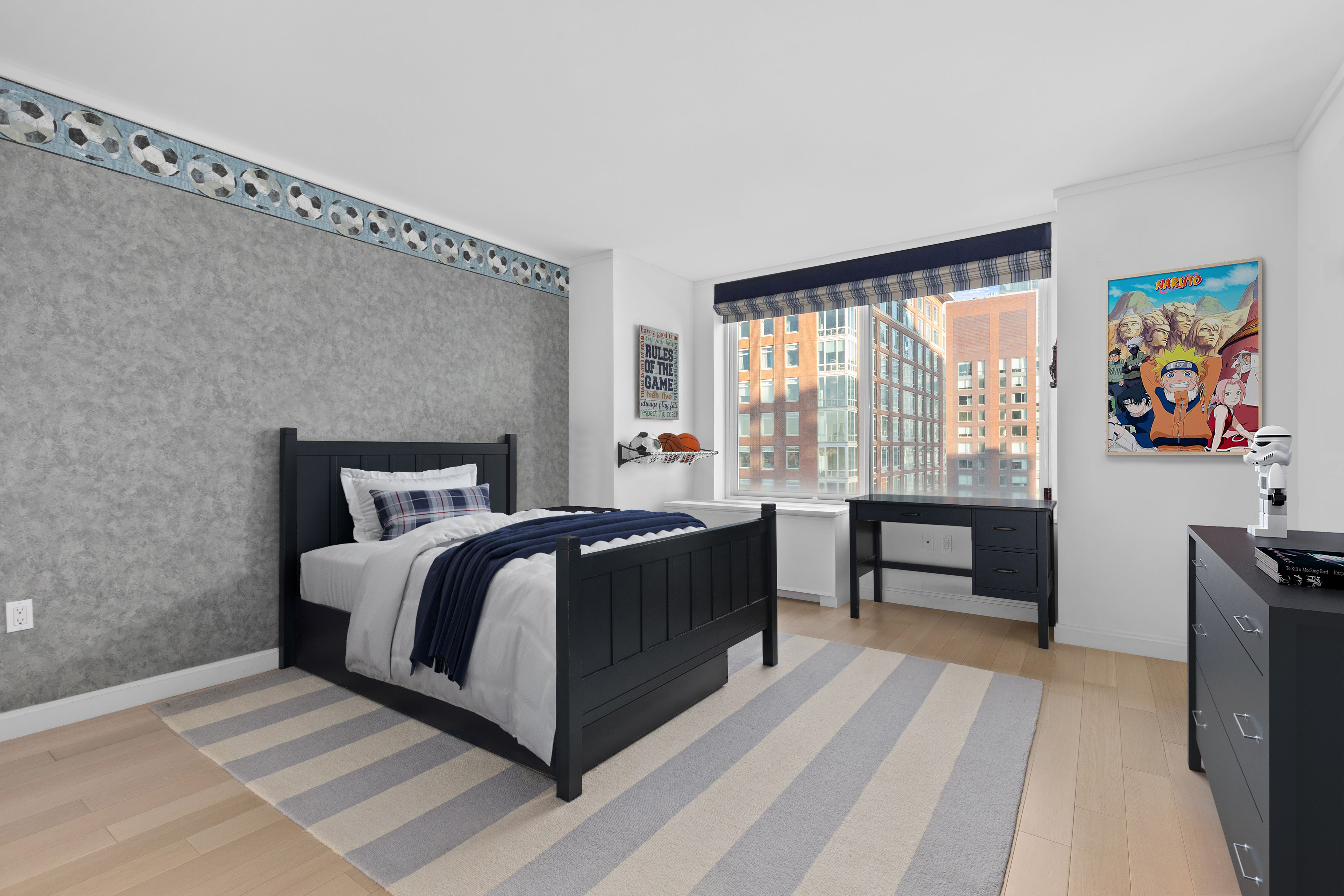 212 Warren Street, Unit 20A Manhattan, NY 10282 - Photo 14 of 23 a bedroom with a bed and a large window