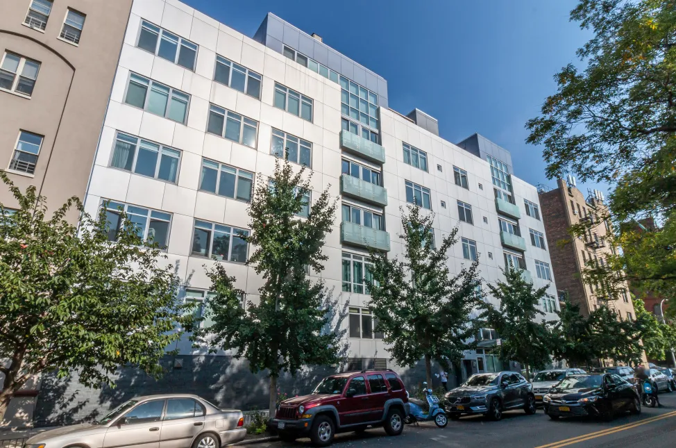 a view of a cars parked in front of a building