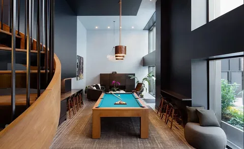 a view of balcony with furniture