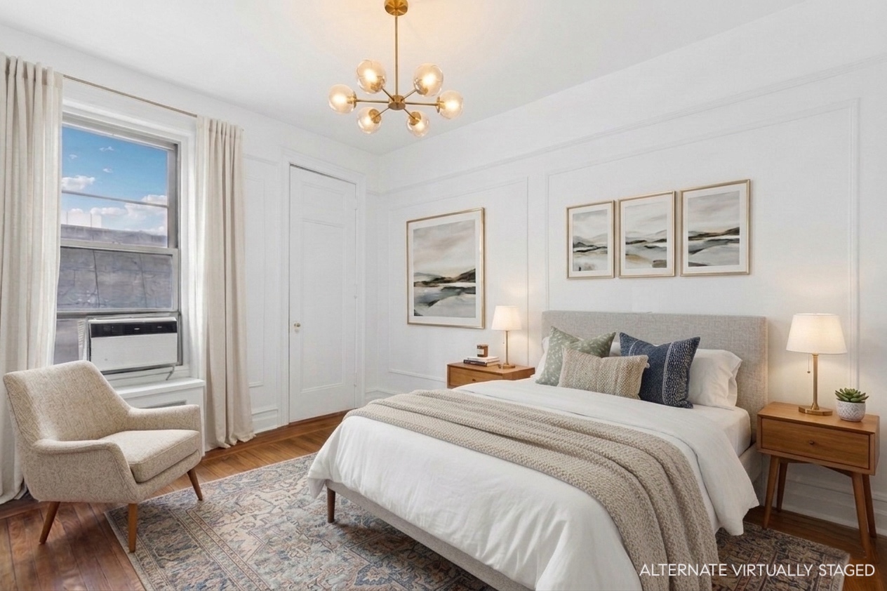 17 East 97th Street, Unit 5A Manhattan, NY 10029 - Photo 16 of 25 a bedroom with a bed and a chandelier