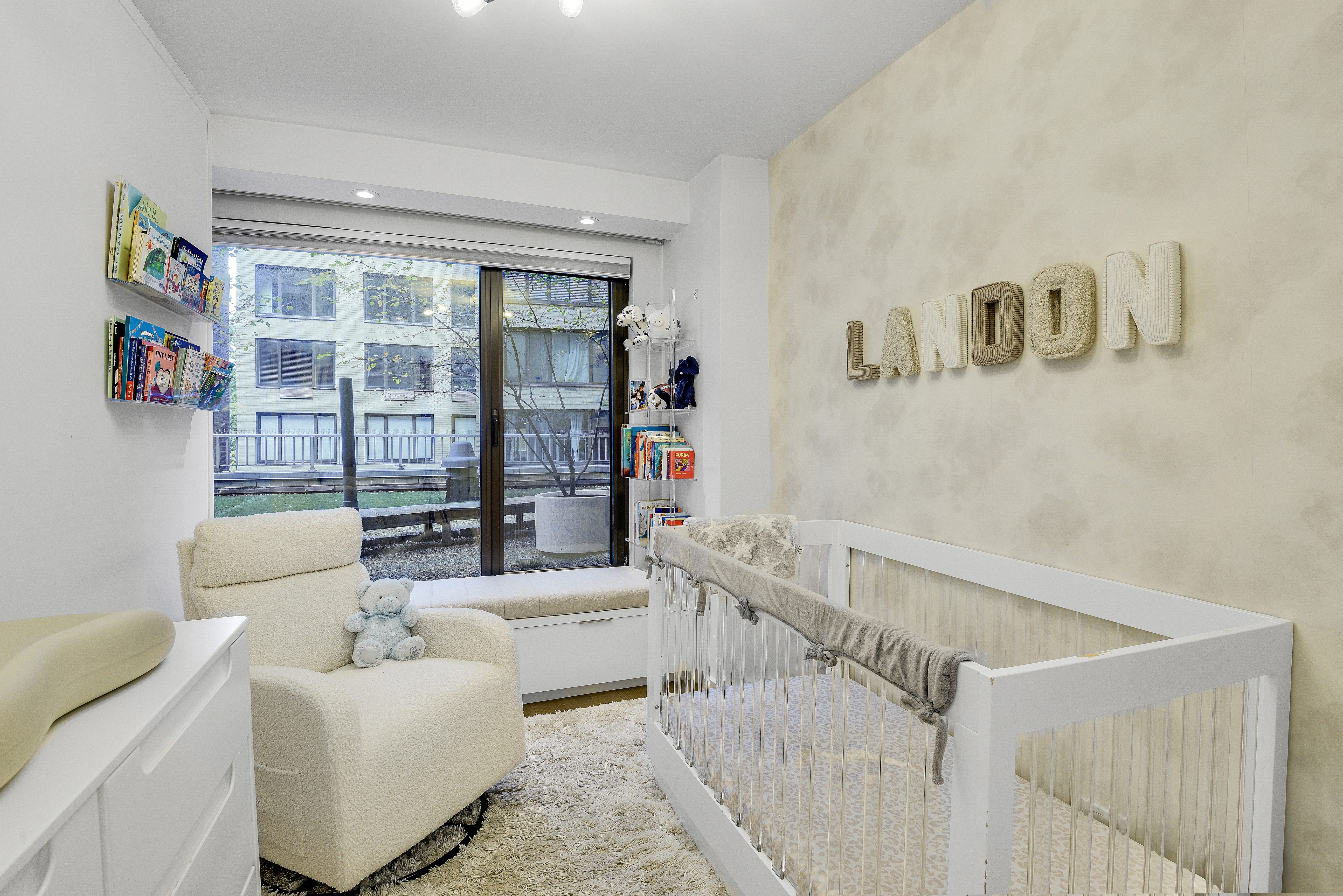 200 Central Park South, Unit 3Q Manhattan, NY 10019 - Photo 9 of 15 a living room with furniture and a large window