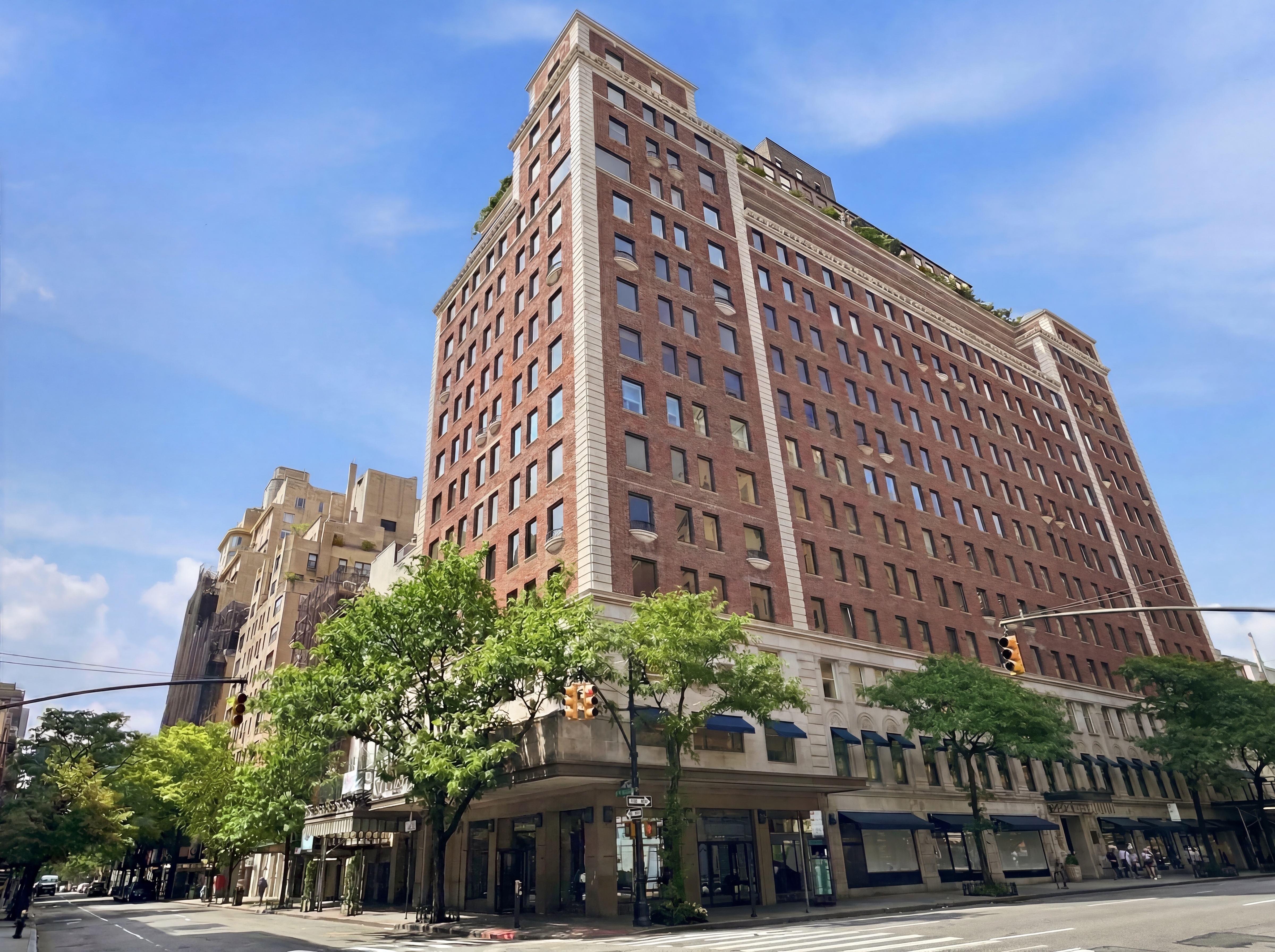 15 East 69th Street, Unit 7A Manhattan, NY 10021 - Photo 22 of 23 a view of a tall building next to a road