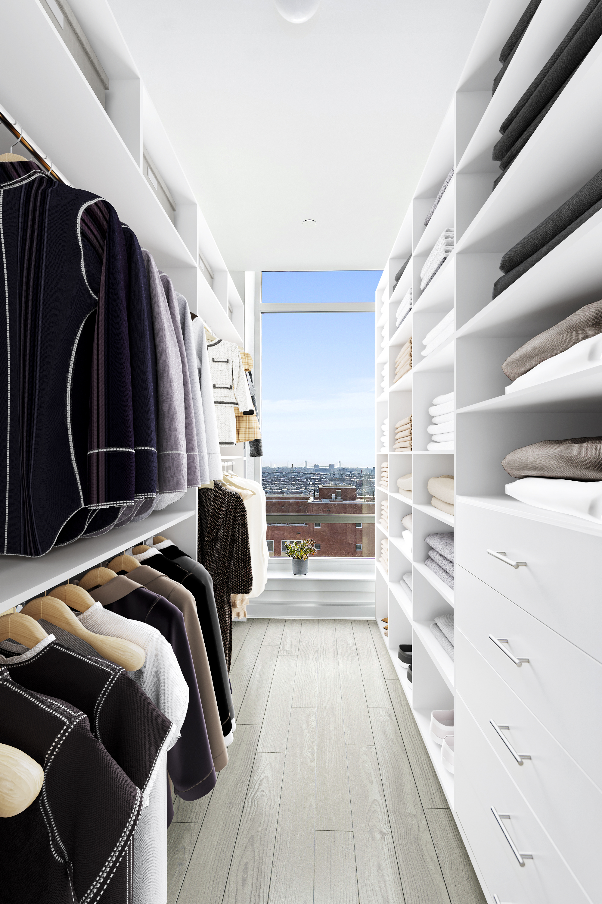 265 State Street, Unit 1601 Brooklyn, NY 11201 - Photo 7 of 14 a view of walk in closet with clothes and shoes