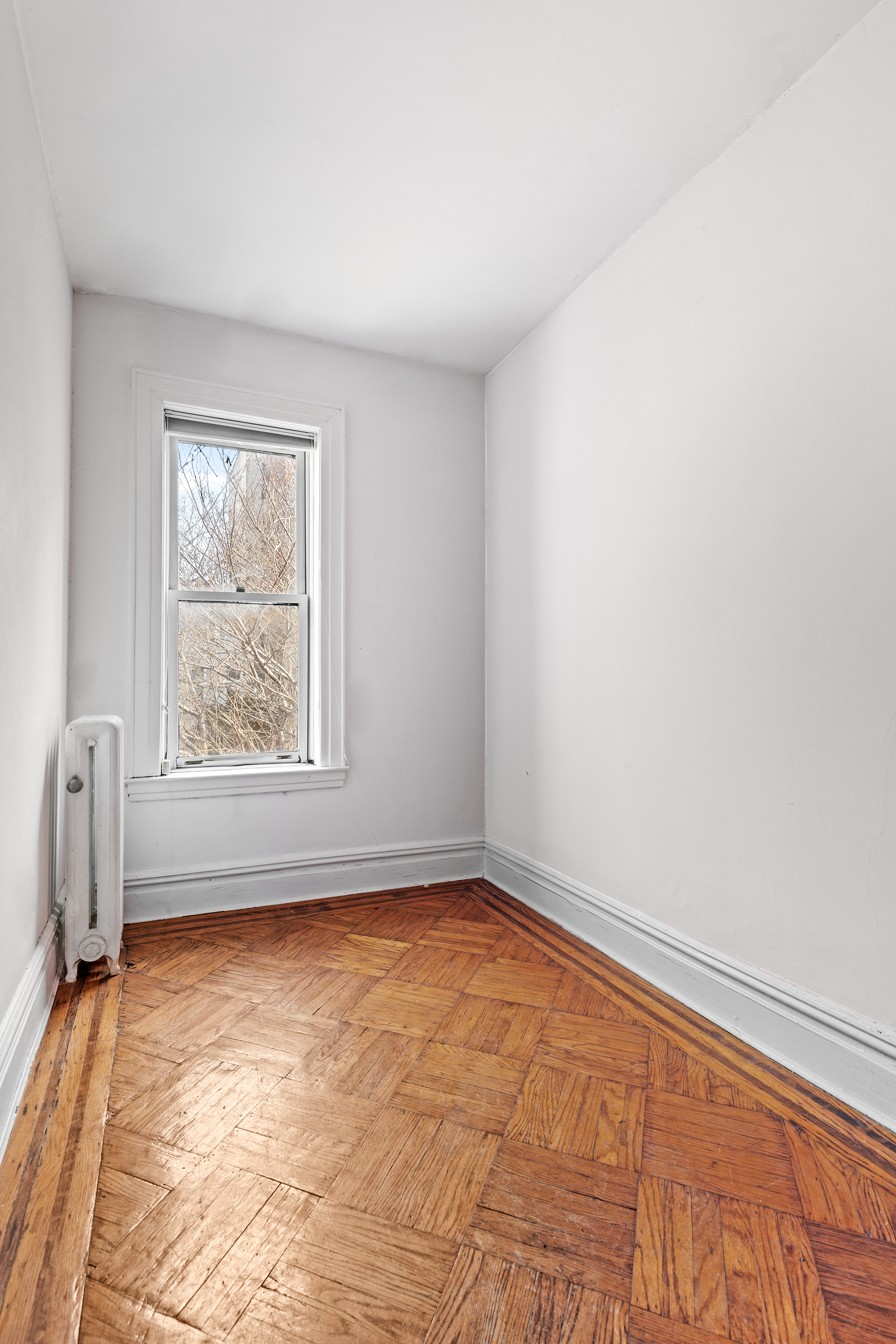 555 16th Street Brooklyn, NY 11215 - Photo 15 of 19 an empty room with a window