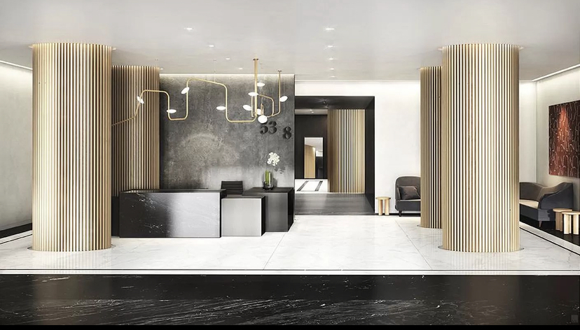 301 West 53rd Street, Unit 8J Manhattan, NY 10019 - Photo 12 of 14 a view of living room with granite countertop furniture and fireplace